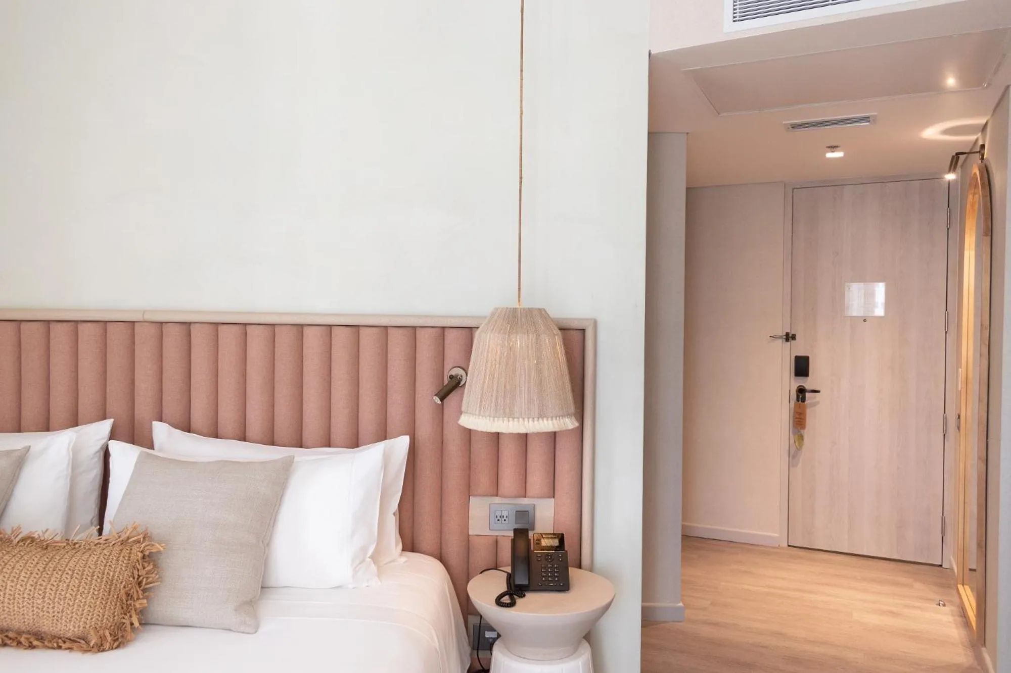 Bed in Nattivo Collection Hotel