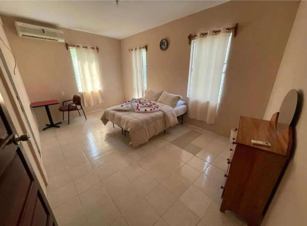 Bed in Arnold's Guest House