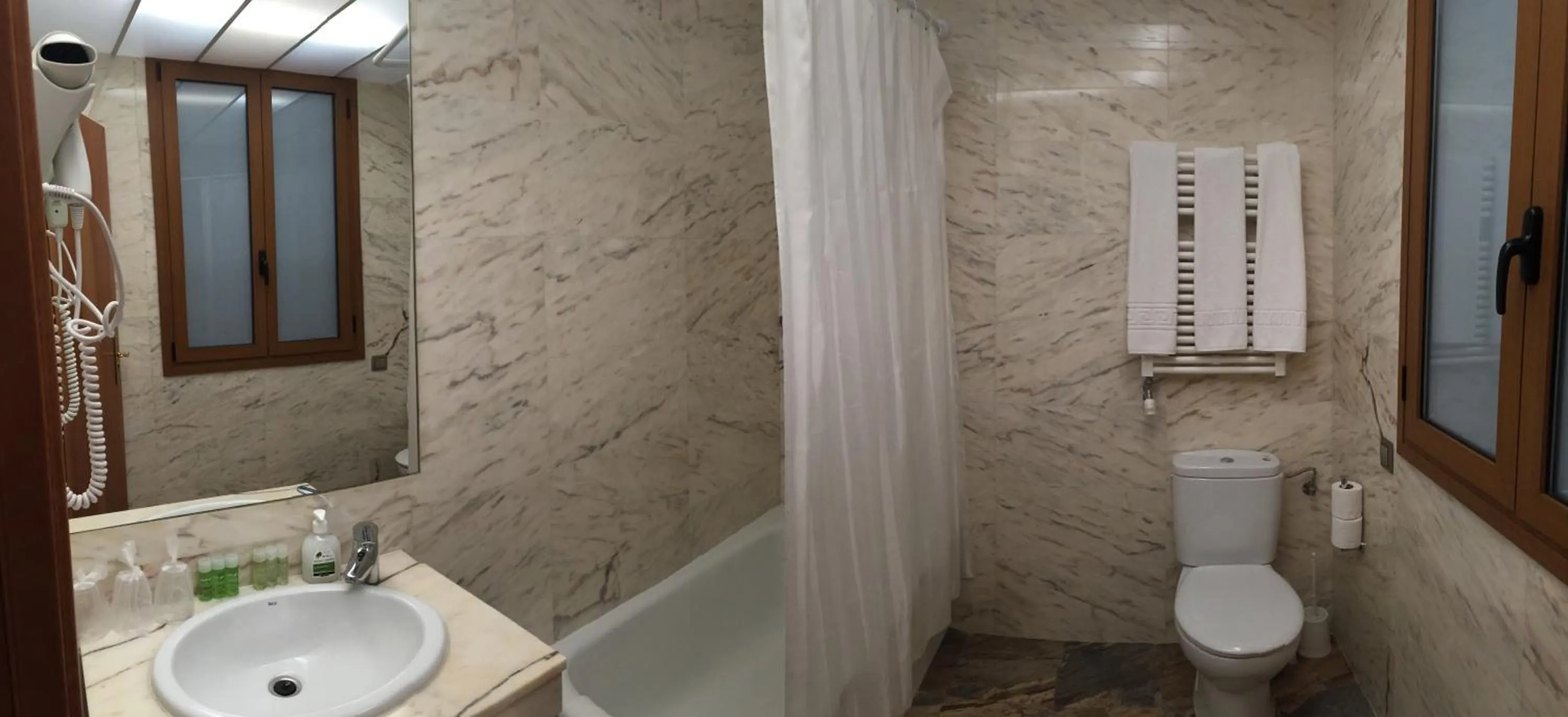 Bathroom in Alba Hotel