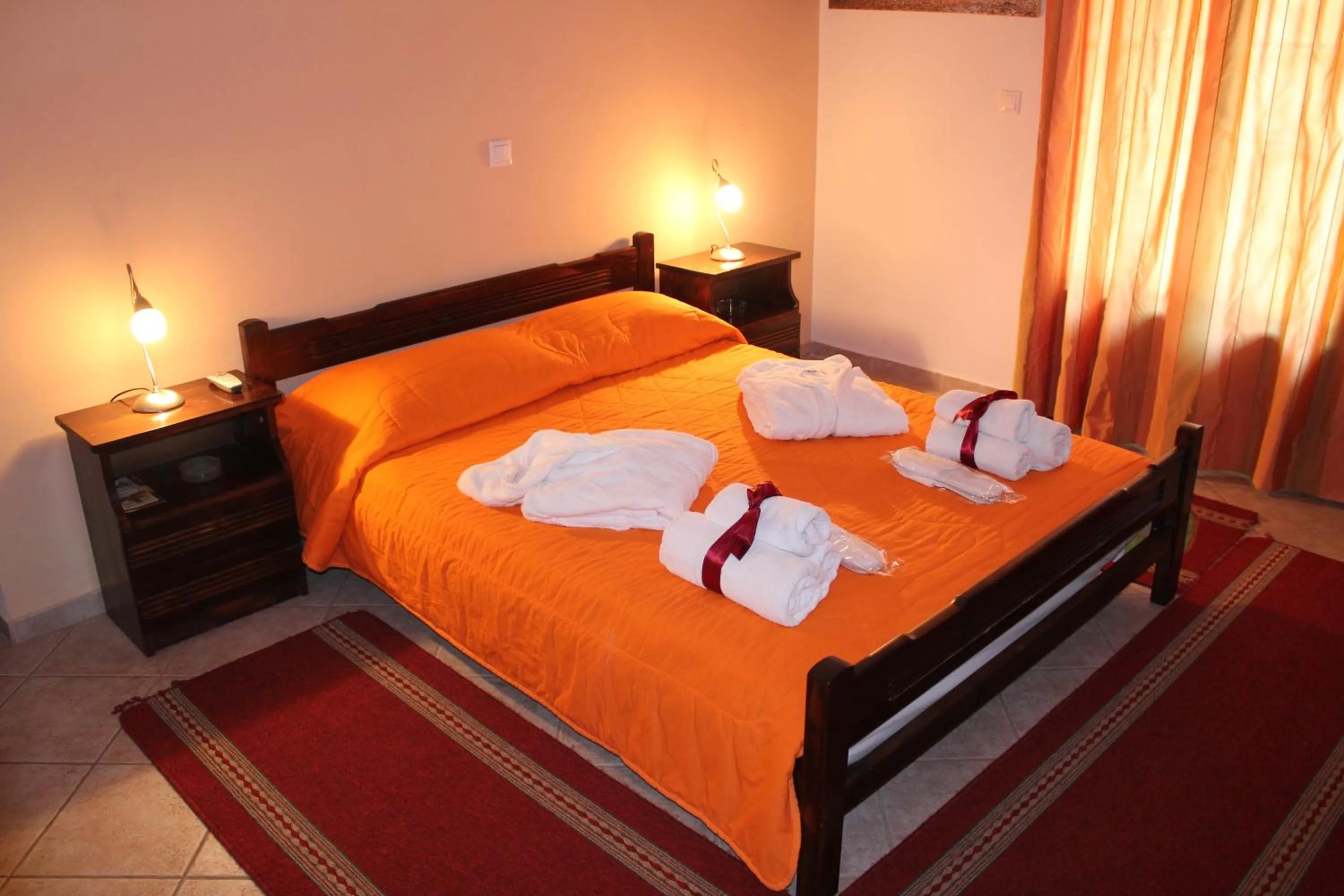 Bed in Artemis Apartments