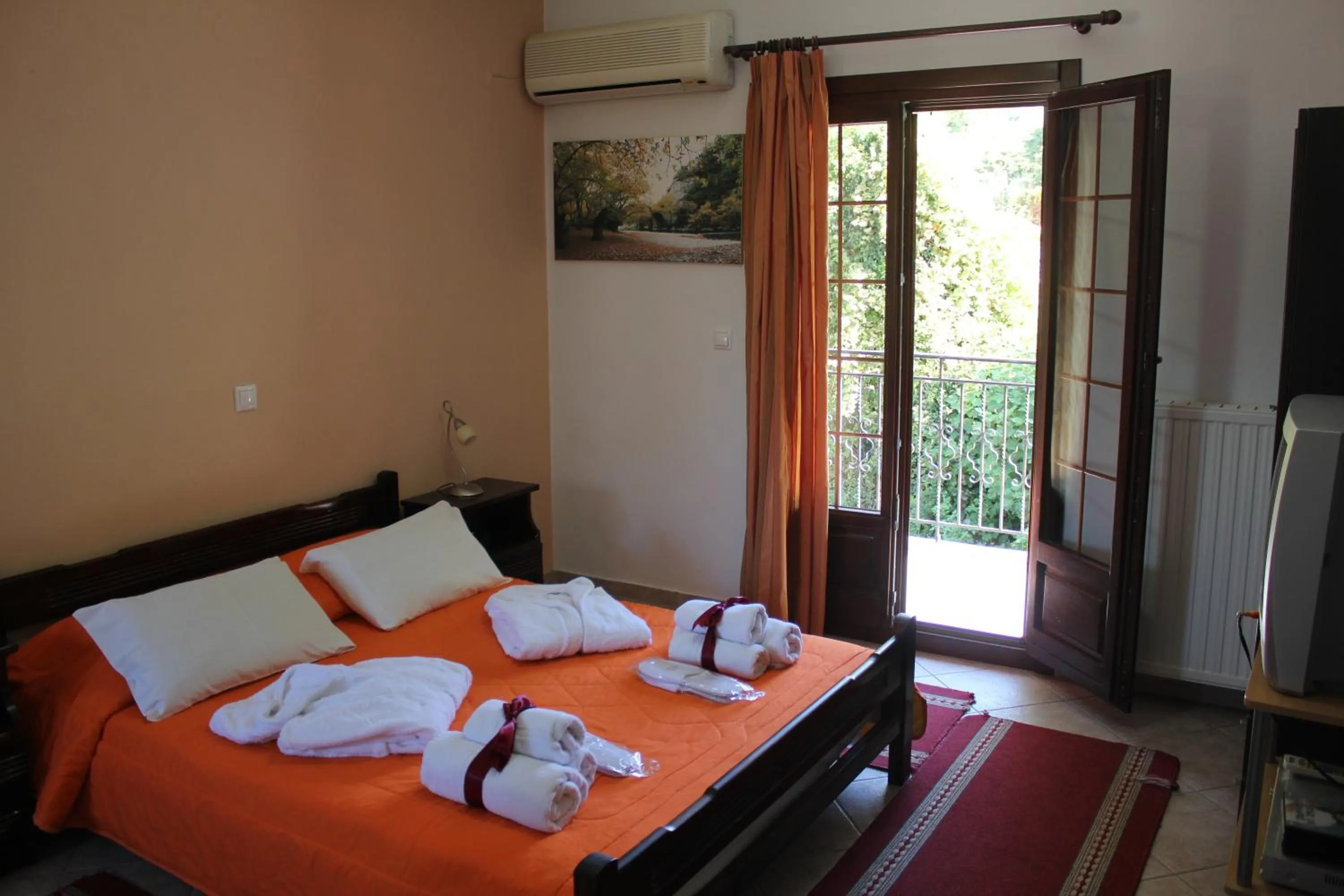 Bed in Artemis Apartments