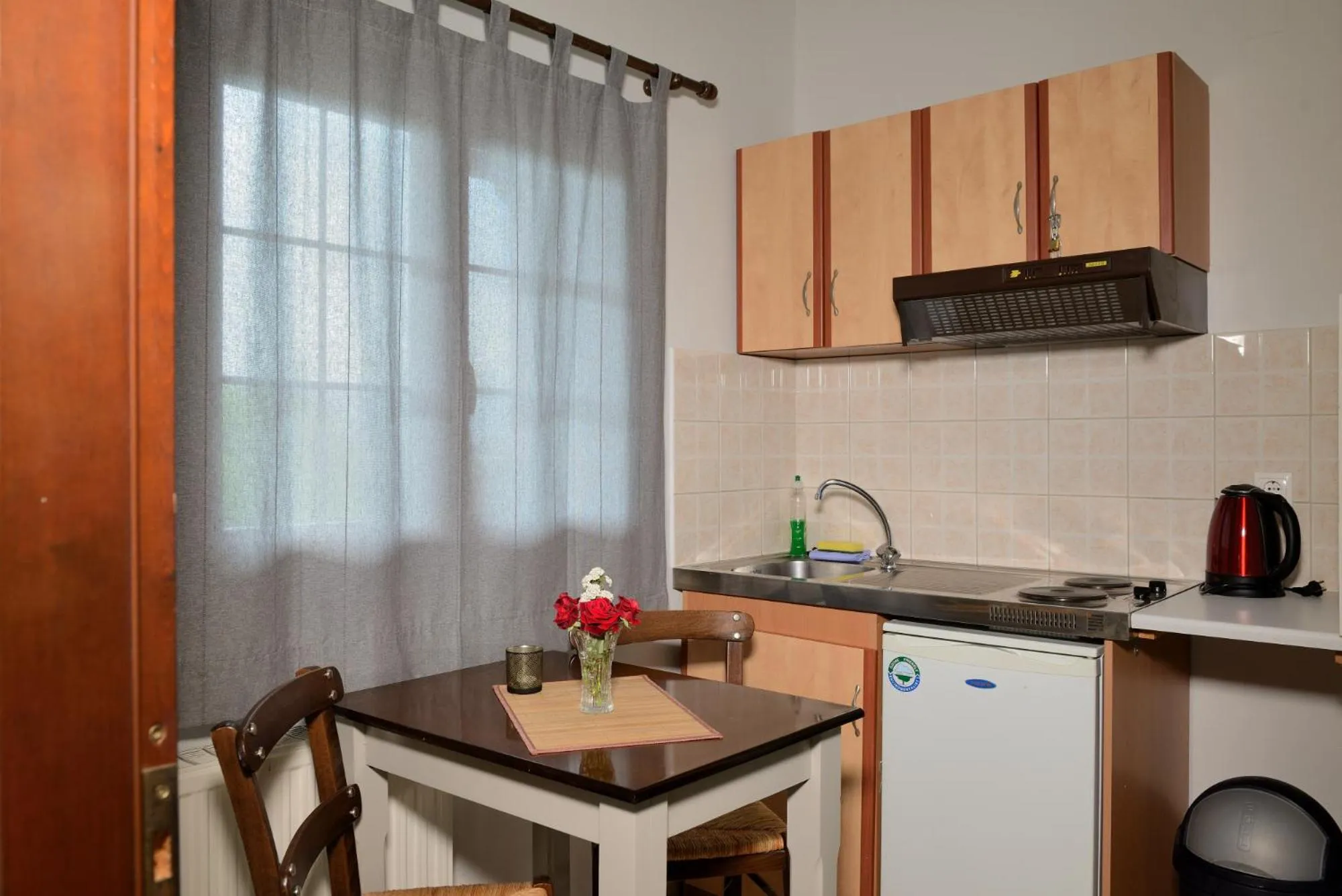 Kitchen or kitchenette in Artemis Apartments
