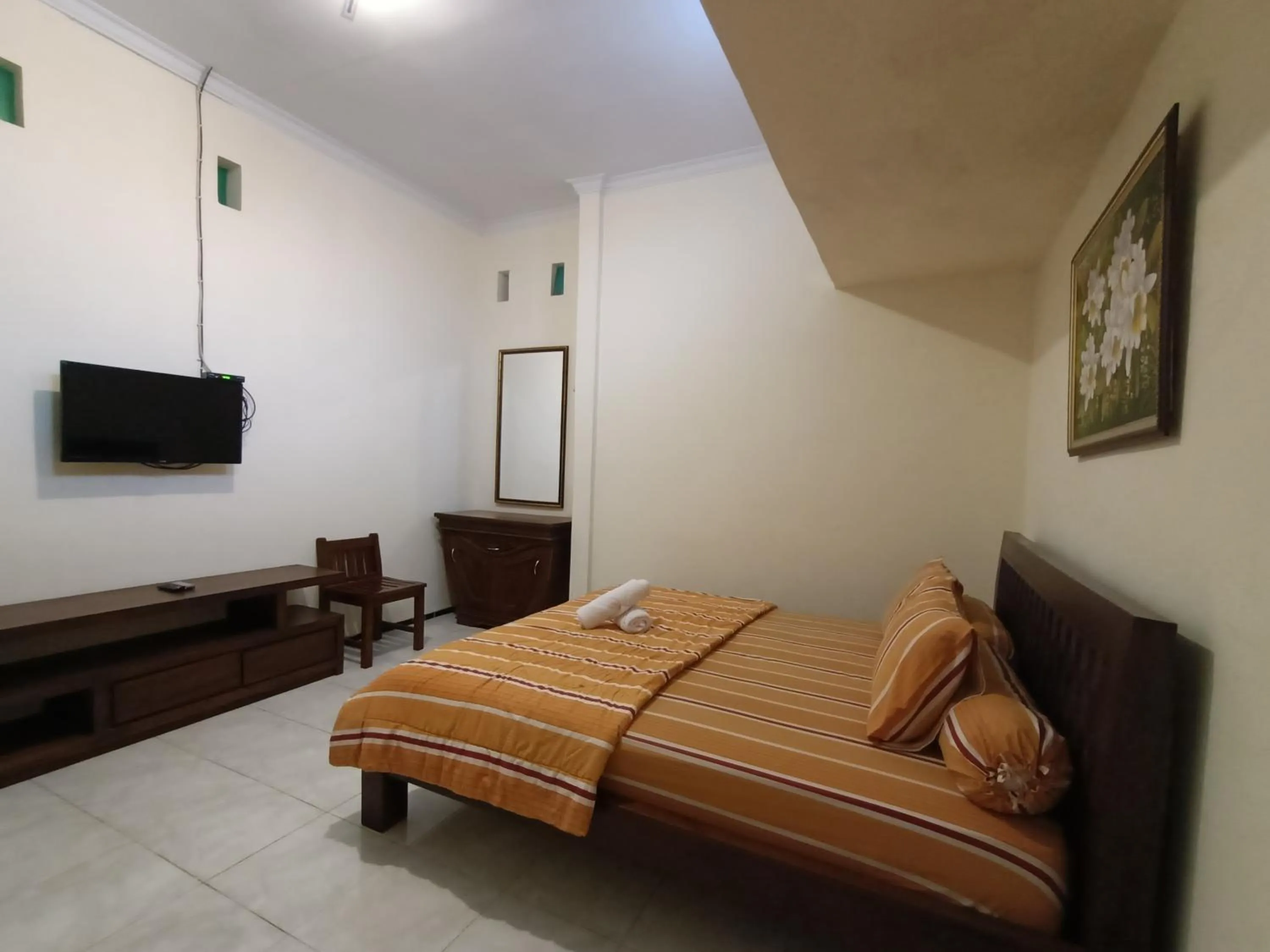 Bed in Rumah Kami Guest House