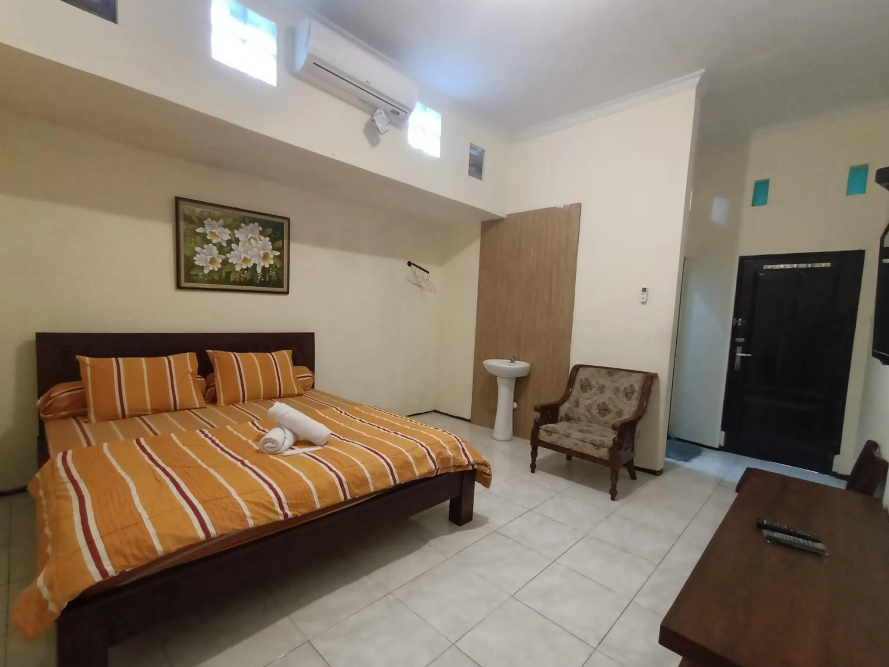 Bed in Rumah Kami Guest House