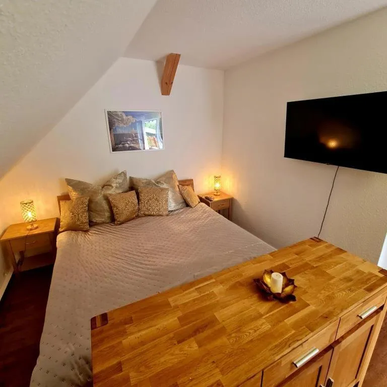 Bed in Urlaubsdomizil Am Töpfer - Ferienwohnungen in Olbersdorf