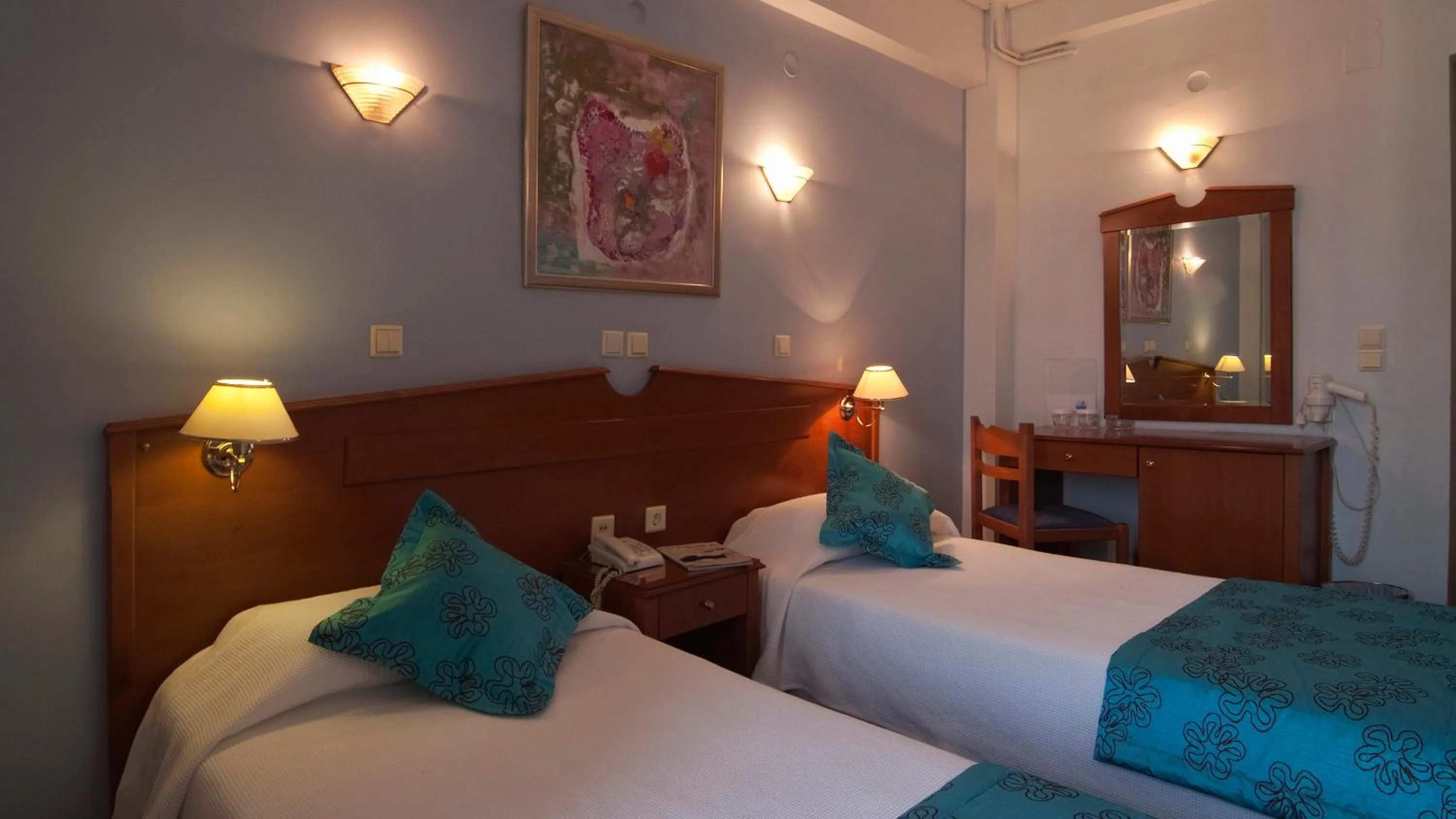 Bed in Triton Hotel Piraeus