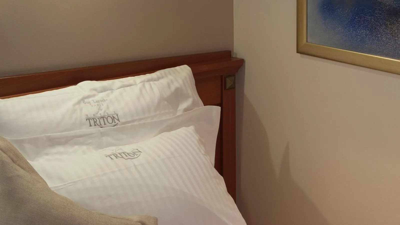 Bed in Triton Hotel Piraeus