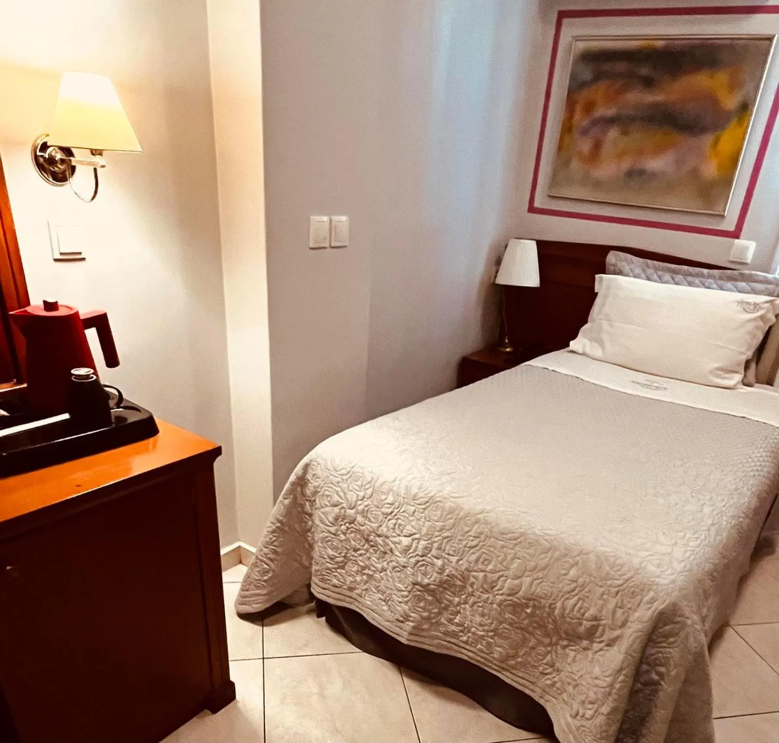 Bed in Triton Hotel Piraeus