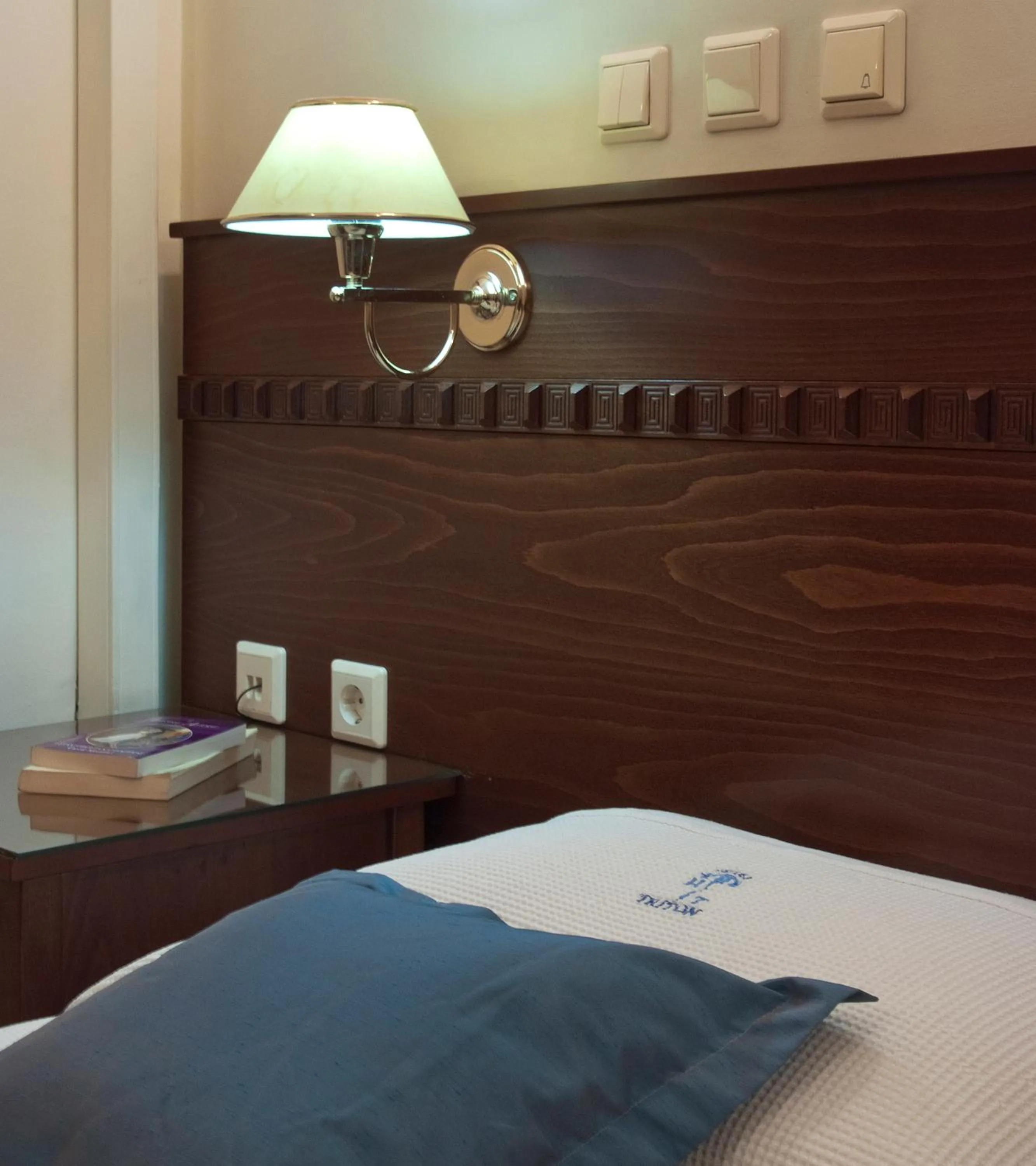 Bed in Triton Hotel Piraeus