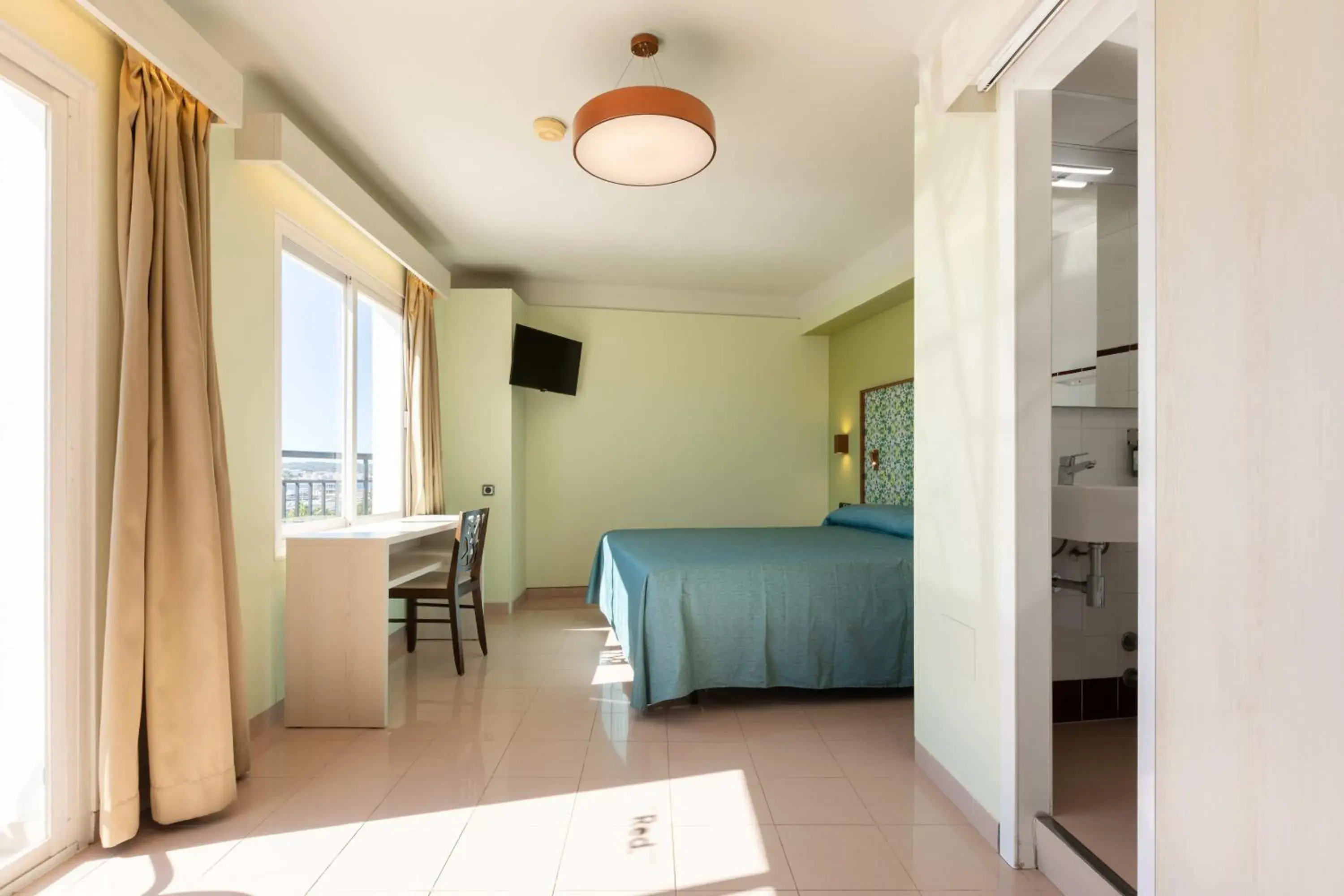 Communal lounge/ TV room, Bed in The Red Hotel - Adults Only Communal lounge/ TV room, Bed in The Red Hotel - Adults Only