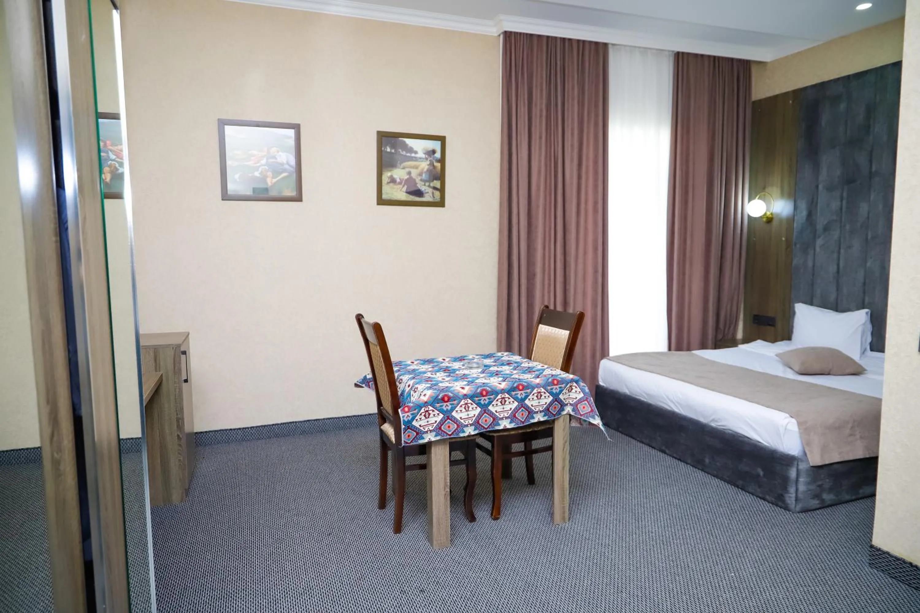 Seating area, Bed in Sunrise Hotel Baku