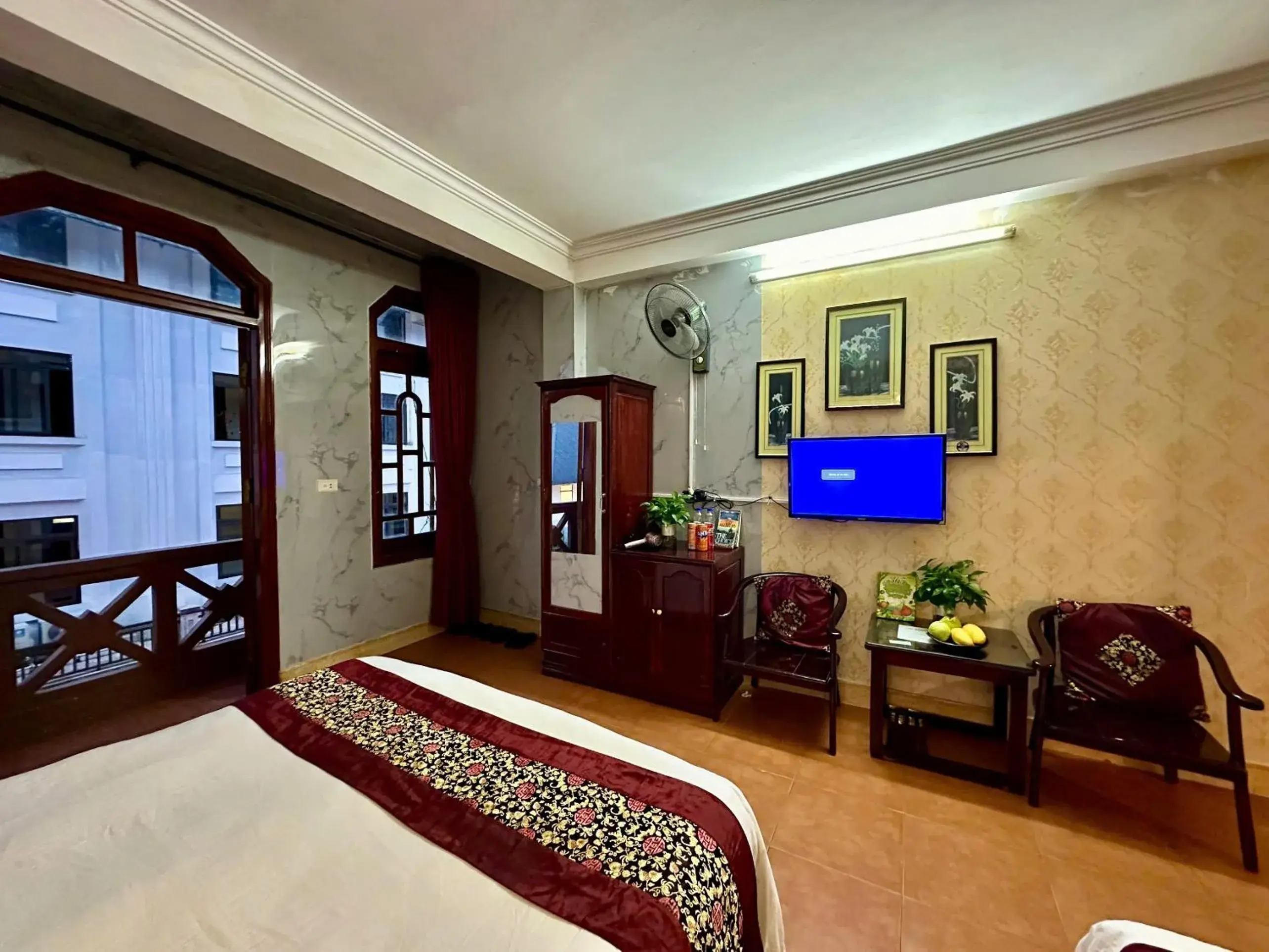 Communal lounge/ TV room, Bed in Hà Giang Hotel Sapa Communal lounge/ TV room, Bed in Hà Giang Hotel Sapa