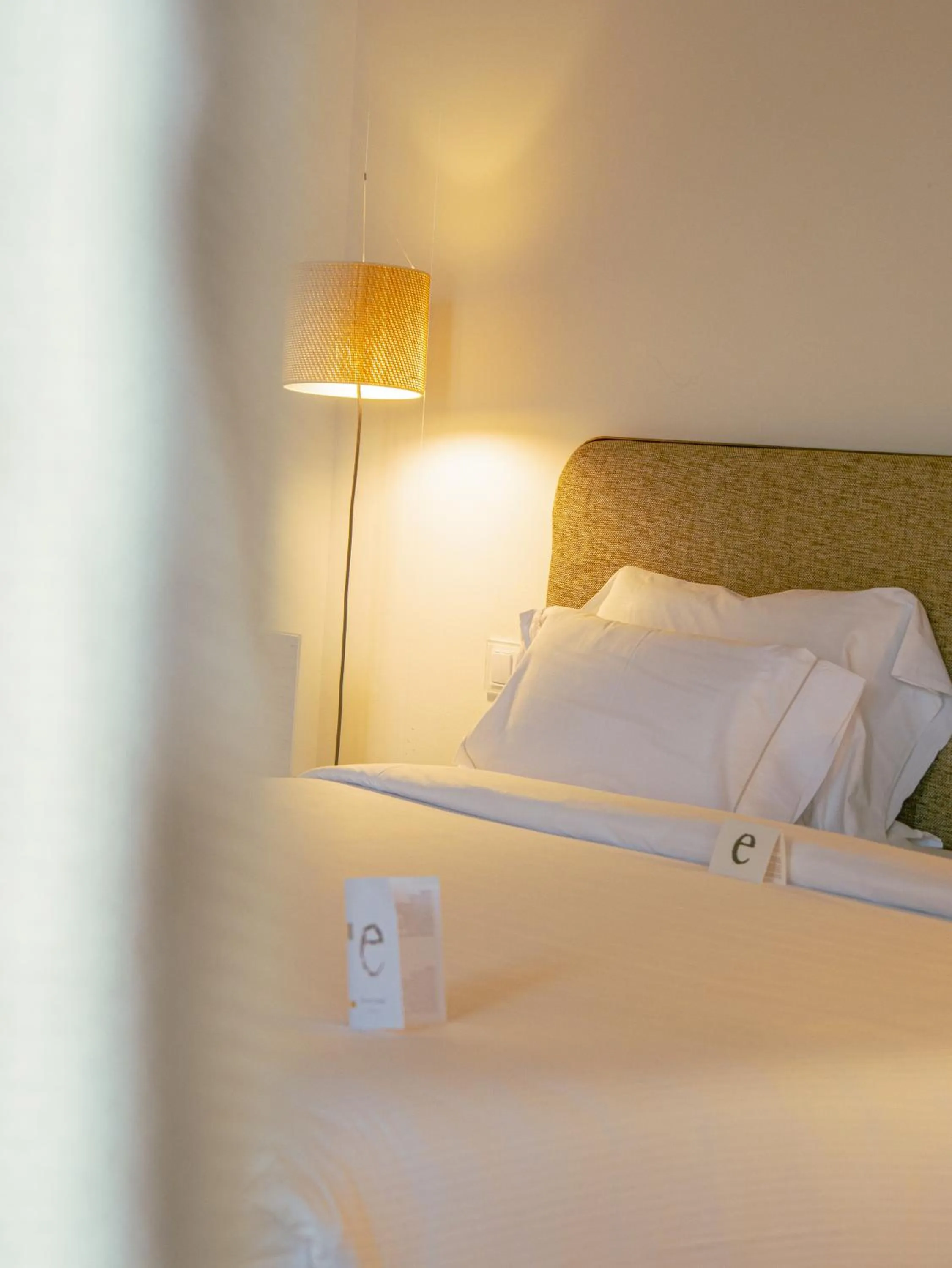 Bed in Hostal Empúries