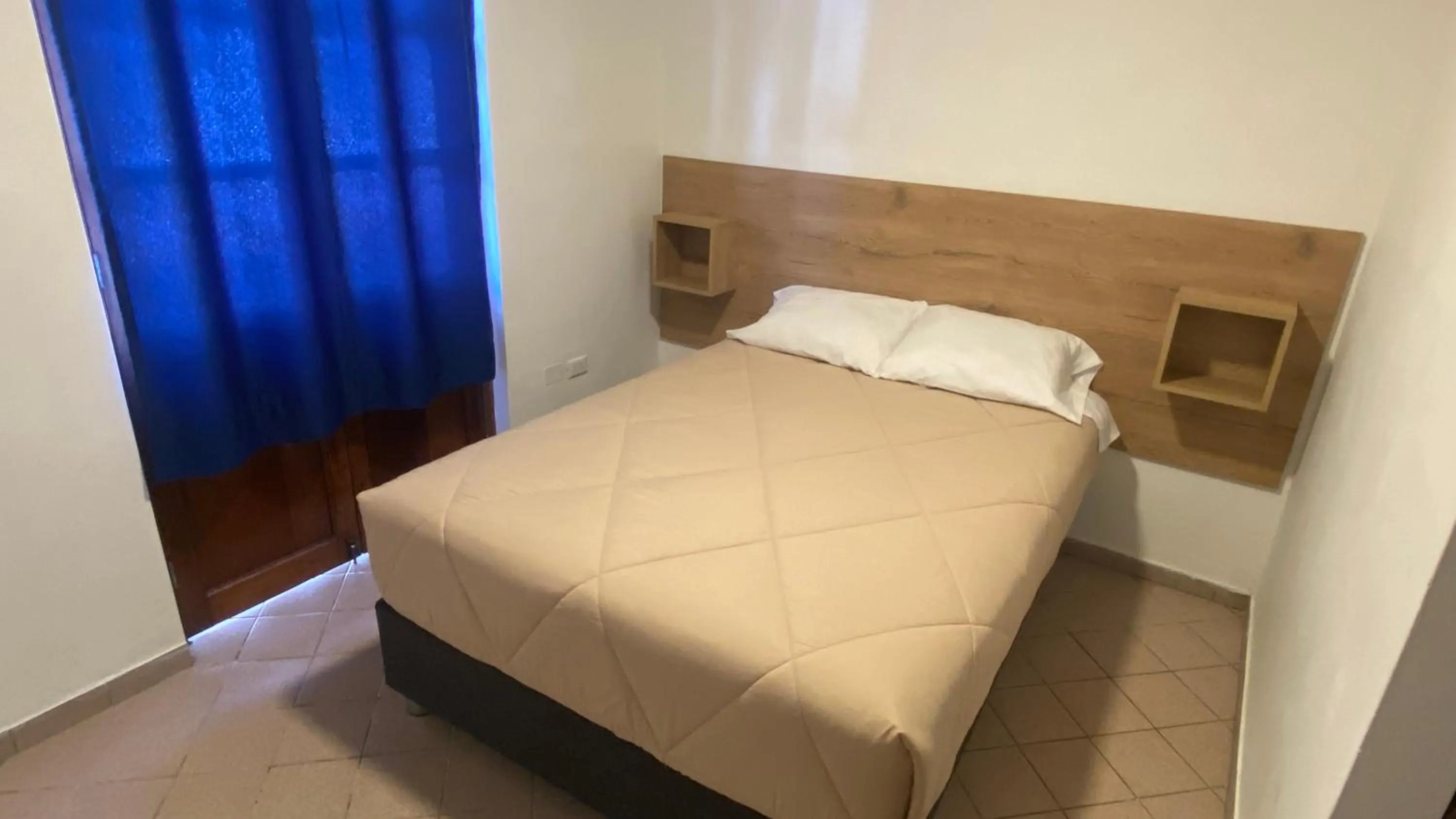 Bed in La Pascana Hospedaje