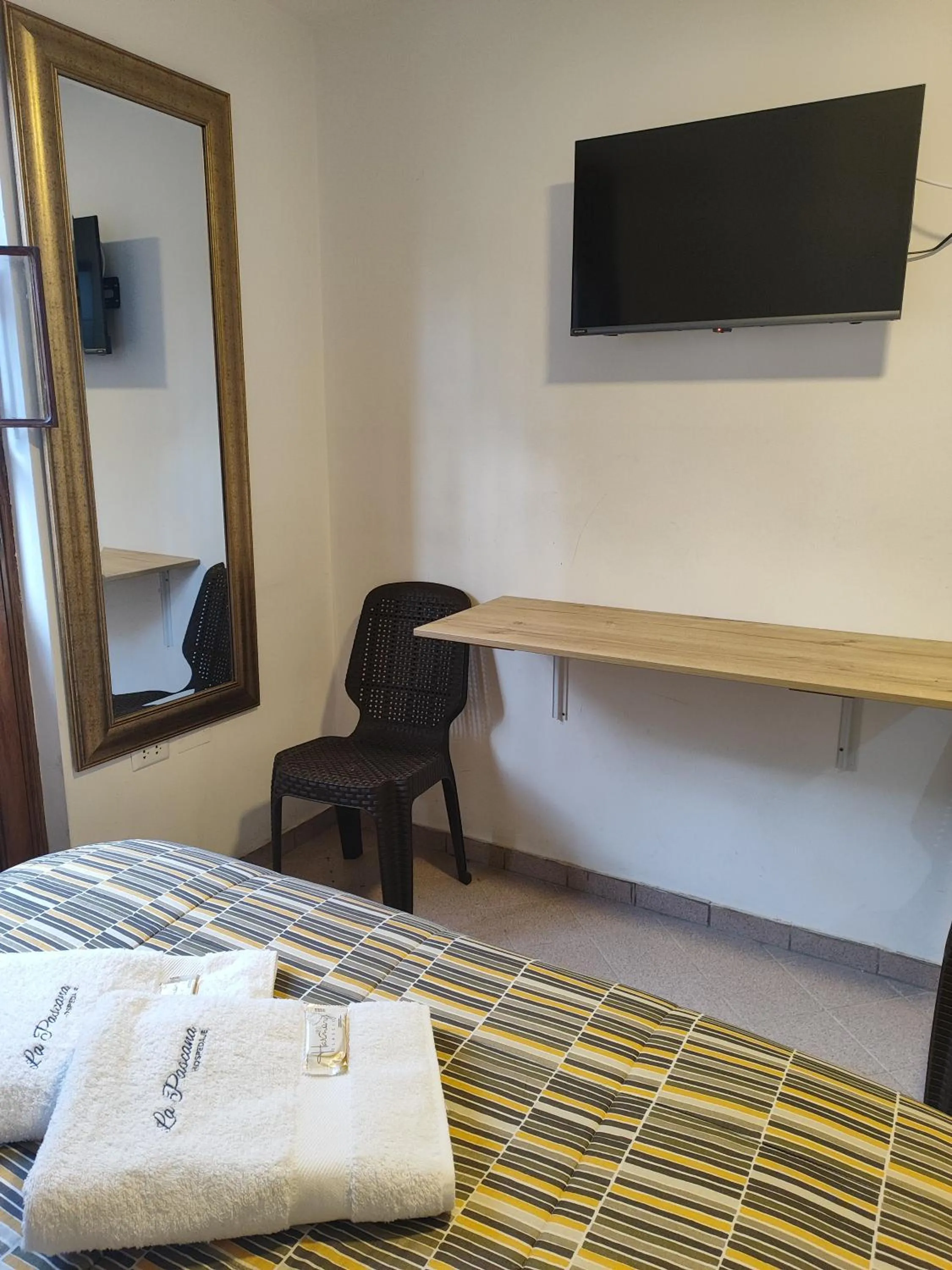 TV and multimedia, Bed in La Pascana Hospedaje