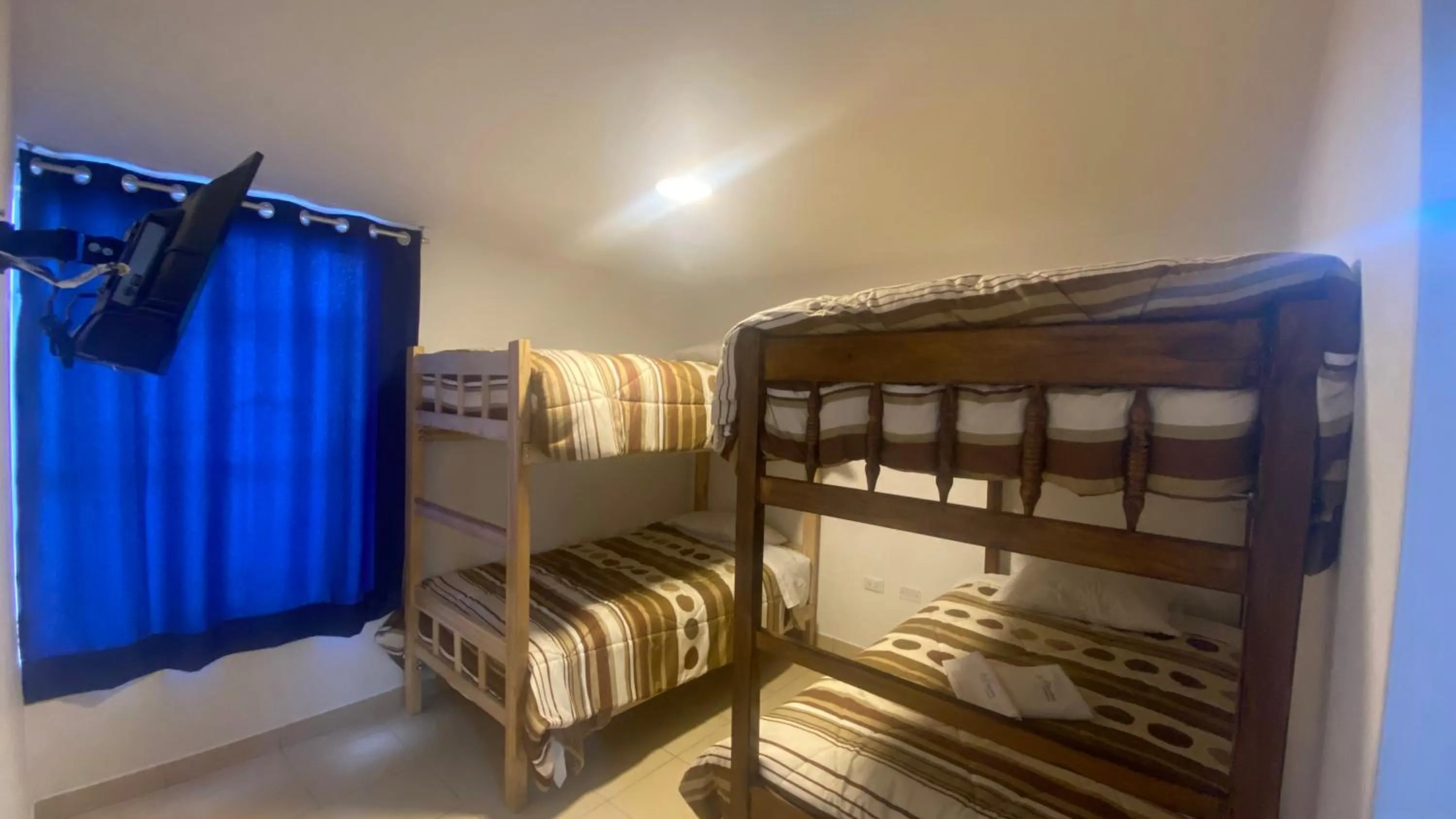 Photo of the whole room, Bed in La Pascana Hospedaje