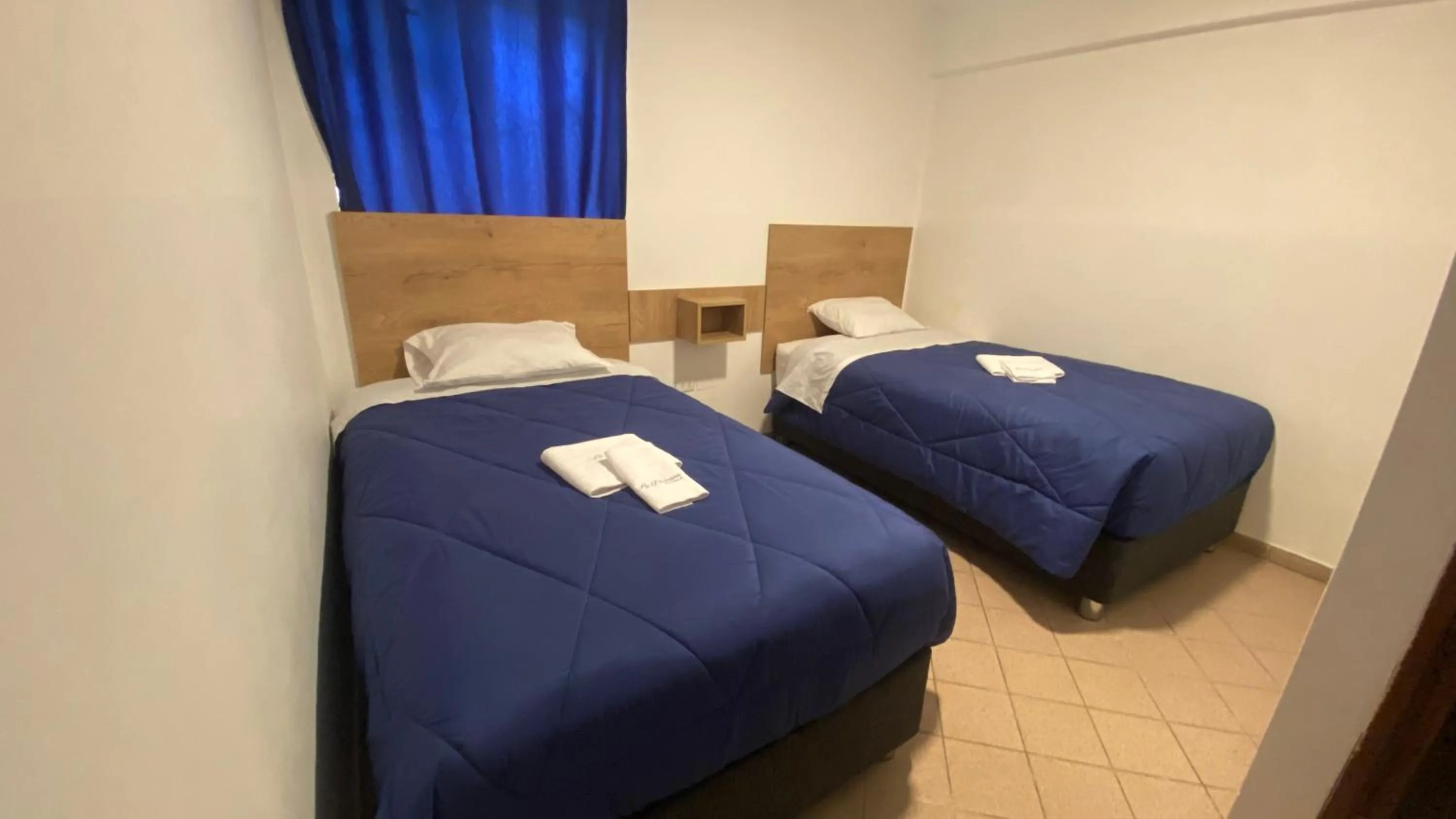 Bed in La Pascana Hospedaje