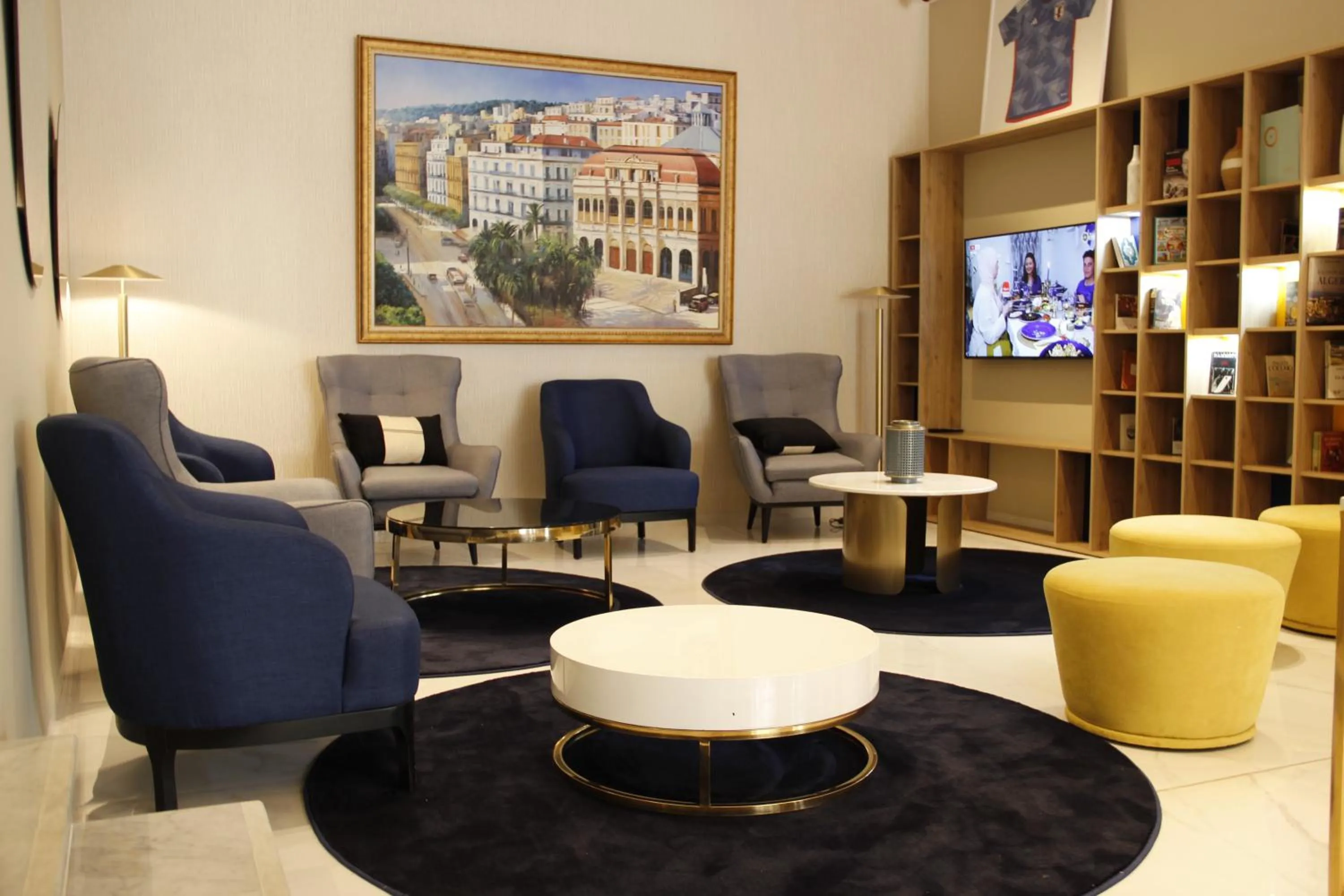 Communal lounge/ TV room in Golden Tulip Opera Alger