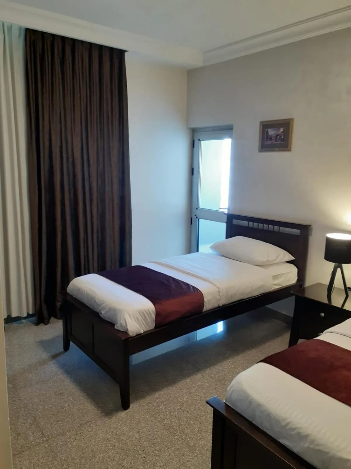 Balcony/Terrace, Bed in Tamrah Suites Hotel