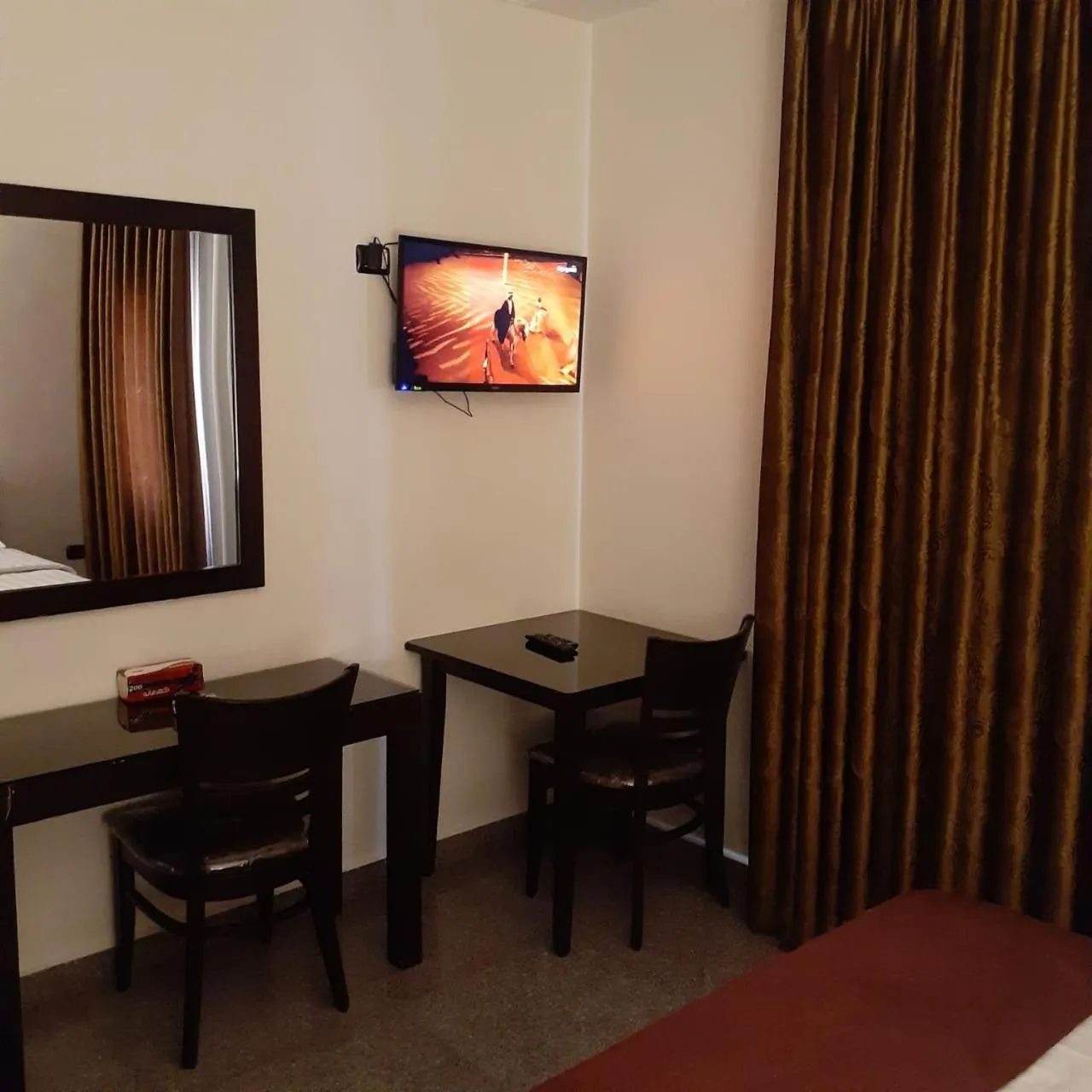 Bedroom, Bed in Tamrah Suites Hotel