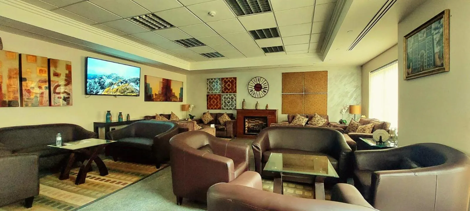 Lobby or reception in Tamrah Suites Hotel