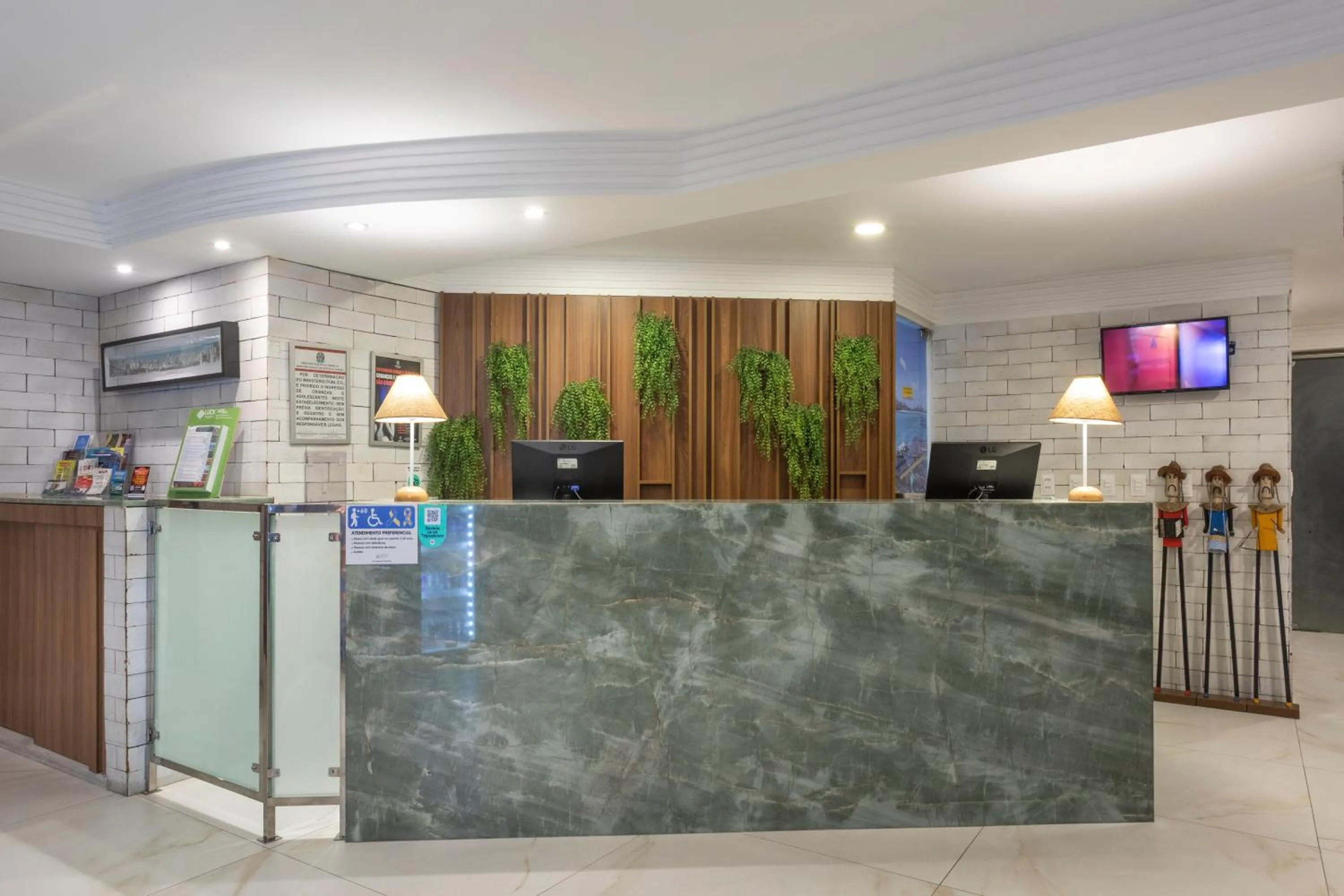 Lobby or reception in Atlântico Praia Hotel