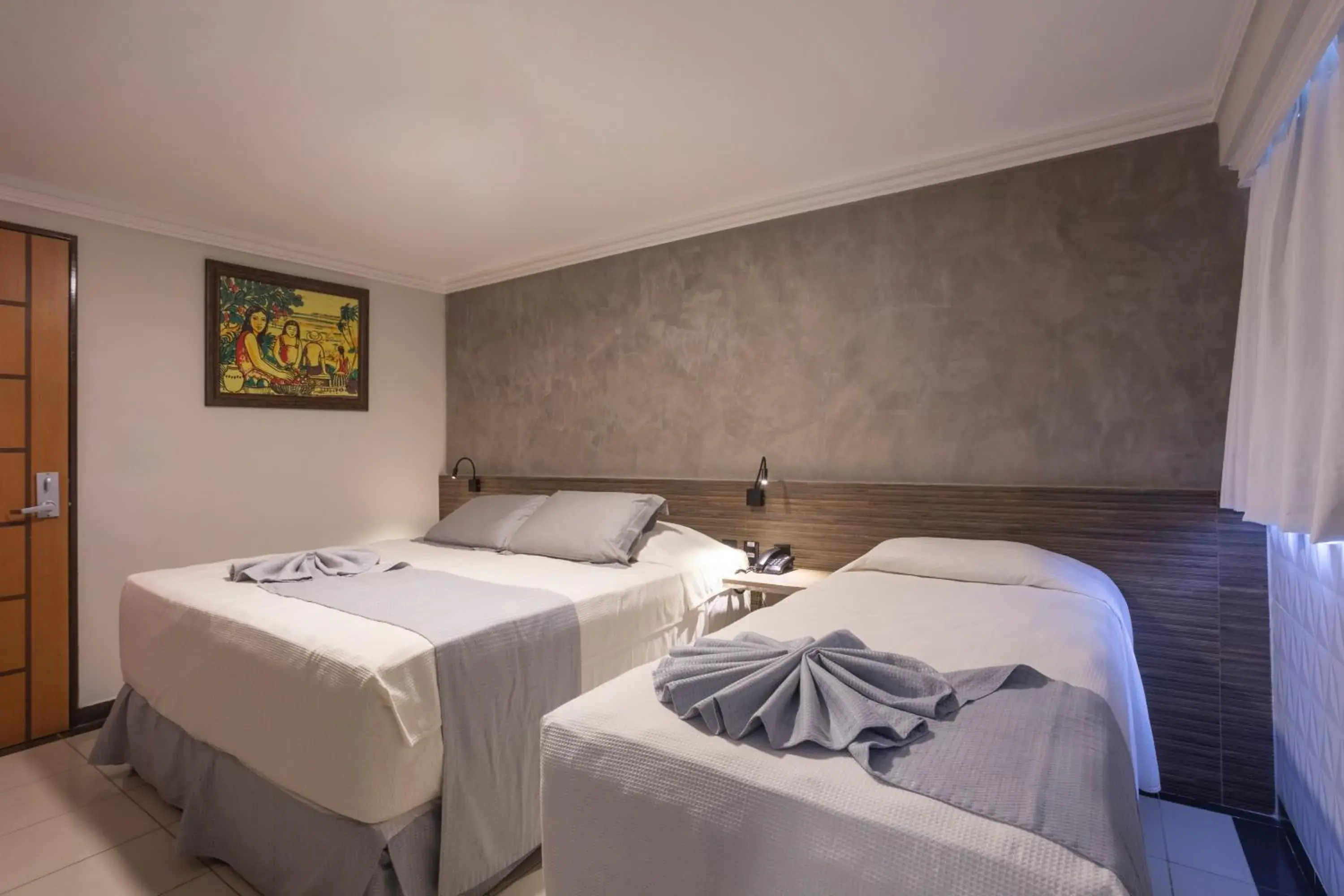 Superior Triple Room with Side Sea View in Atlântico Praia Hotel Superior Triple Room with Side Sea View in Atlântico Praia Hotel