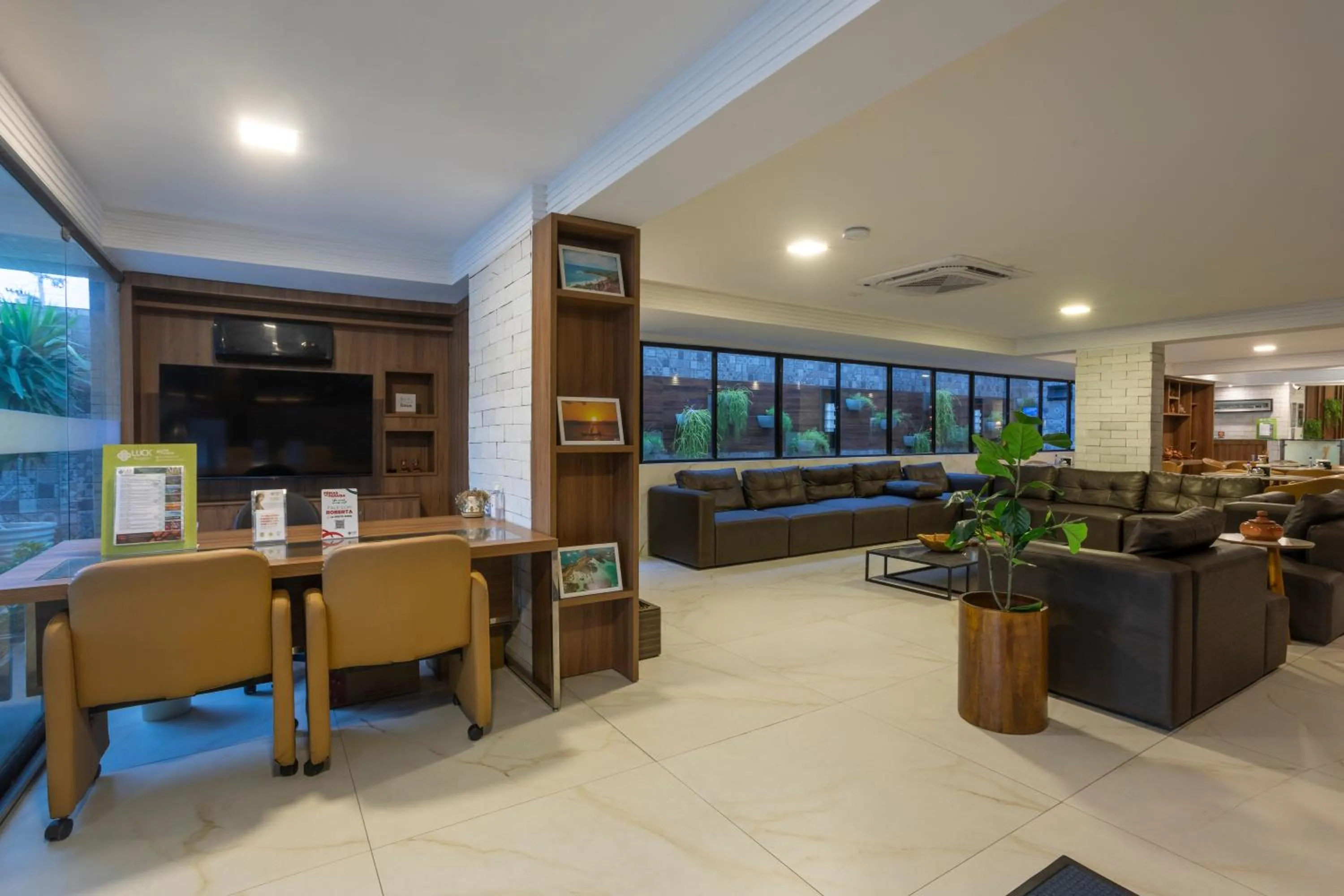 Communal lounge/ TV room in Atlântico Praia Hotel