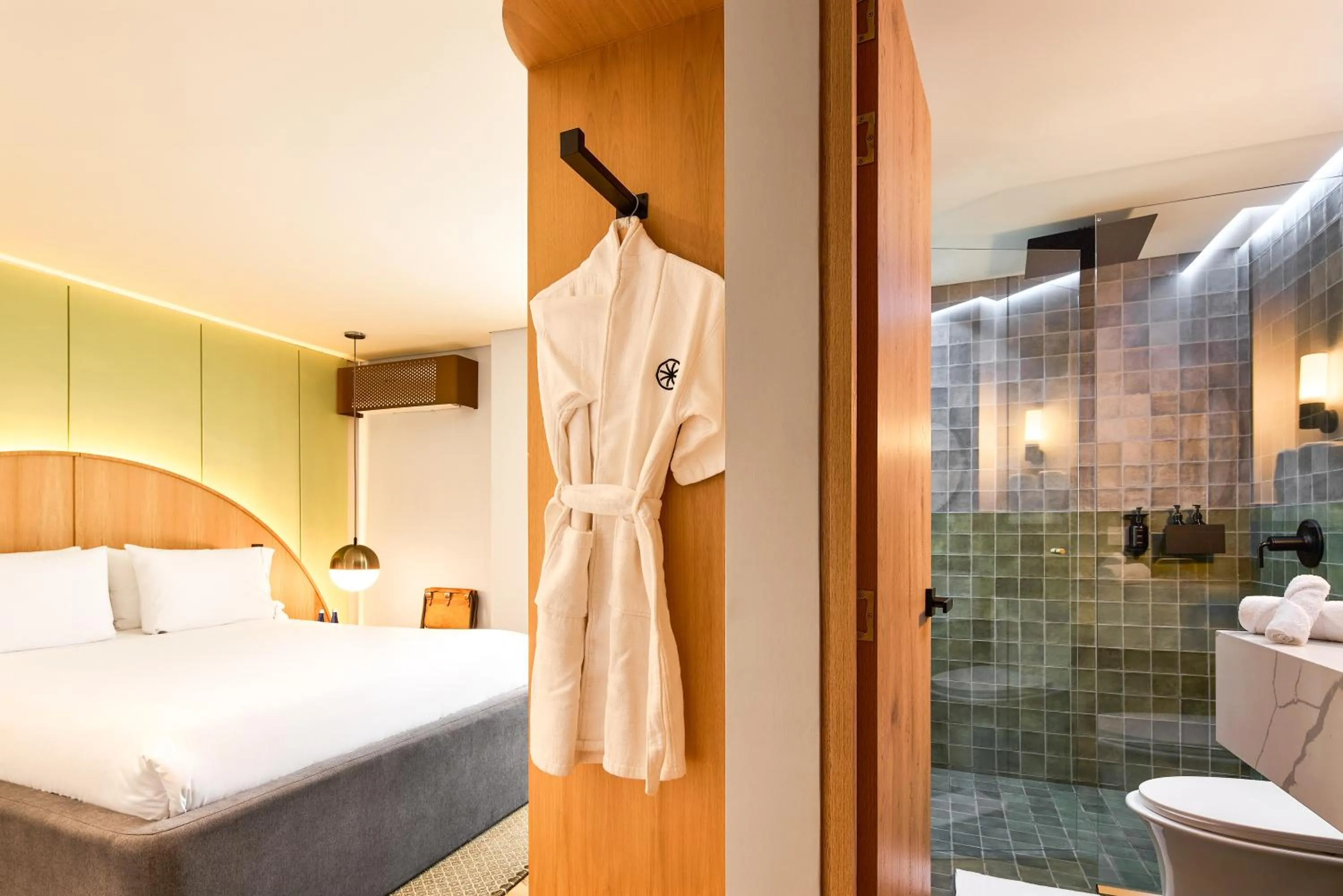 Bathroom, Bed in Wellcomm Spa & Hotel