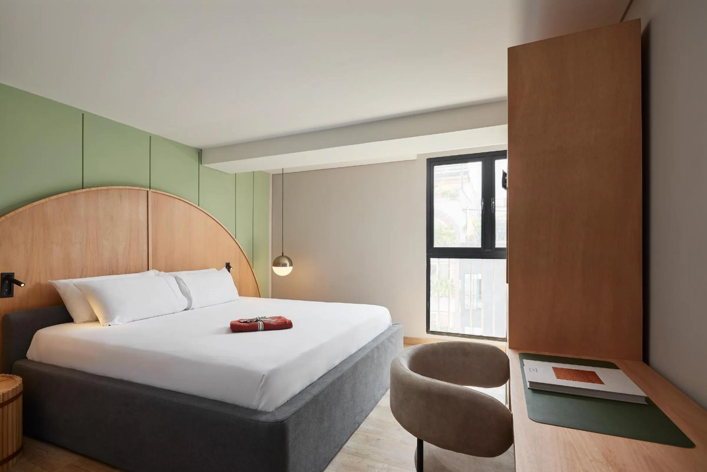 Bed in Wellcomm Spa & Hotel