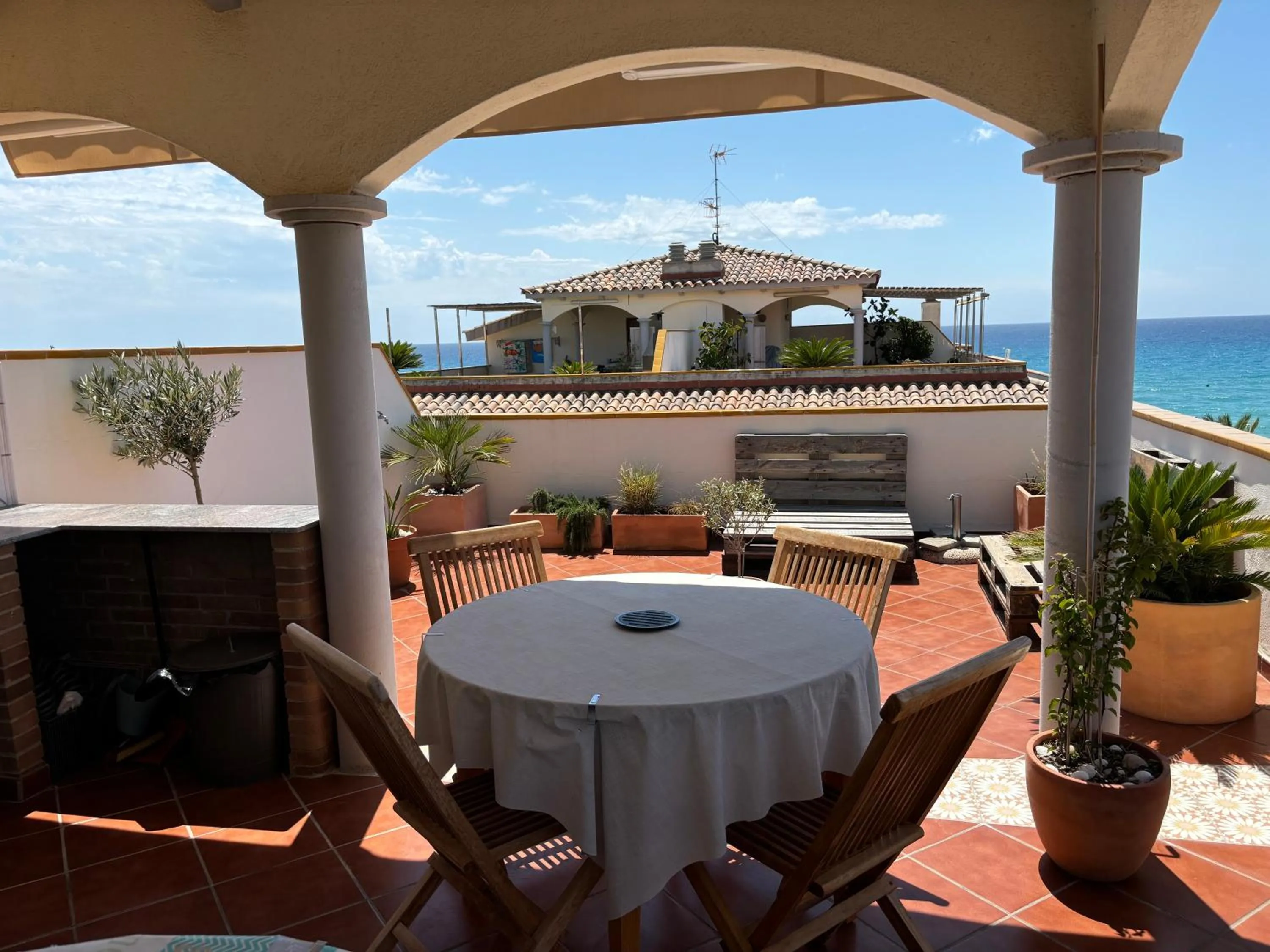 Cal SalMaré seafront apartment with rooftop terrace and pool
