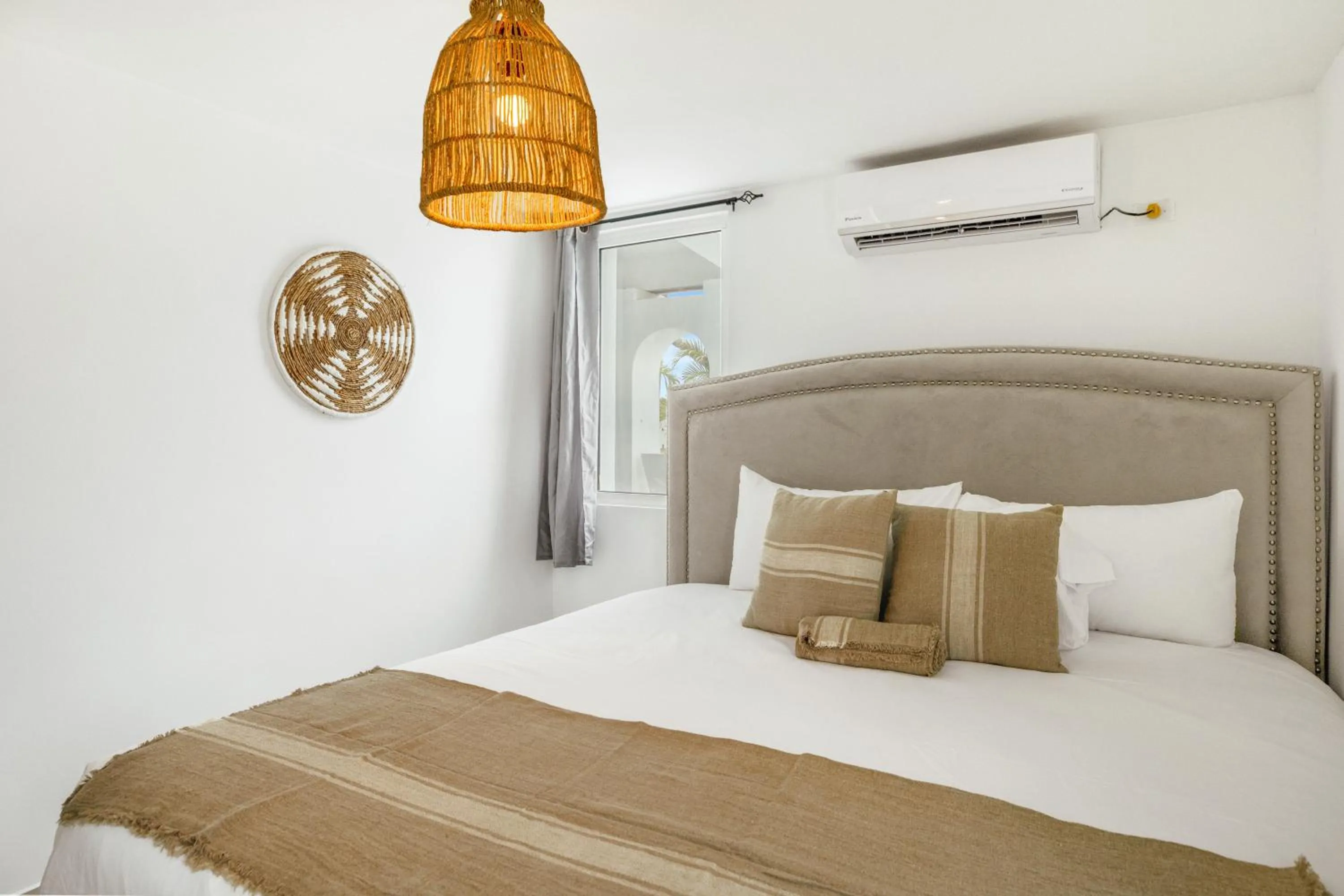 Bed in CocoVaa Beach Boutique Hotel