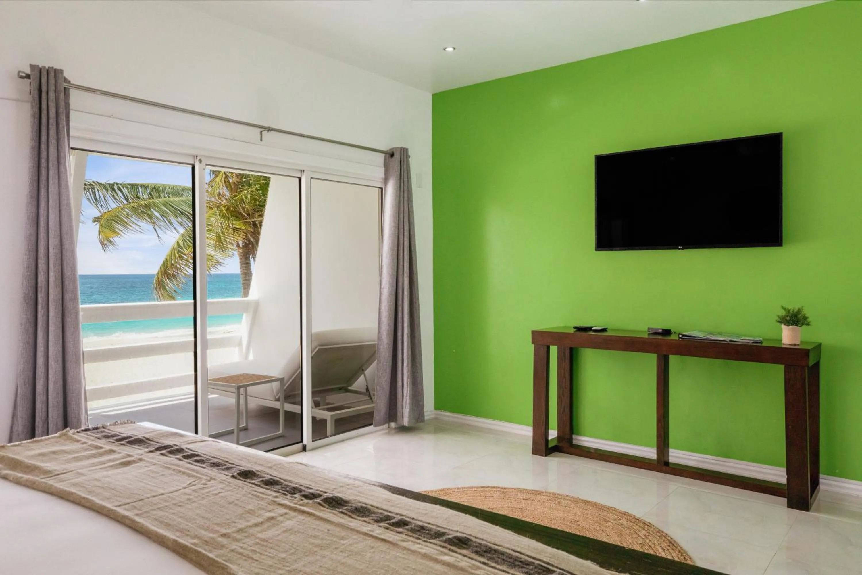 Bed in CocoVaa Beach Boutique Hotel