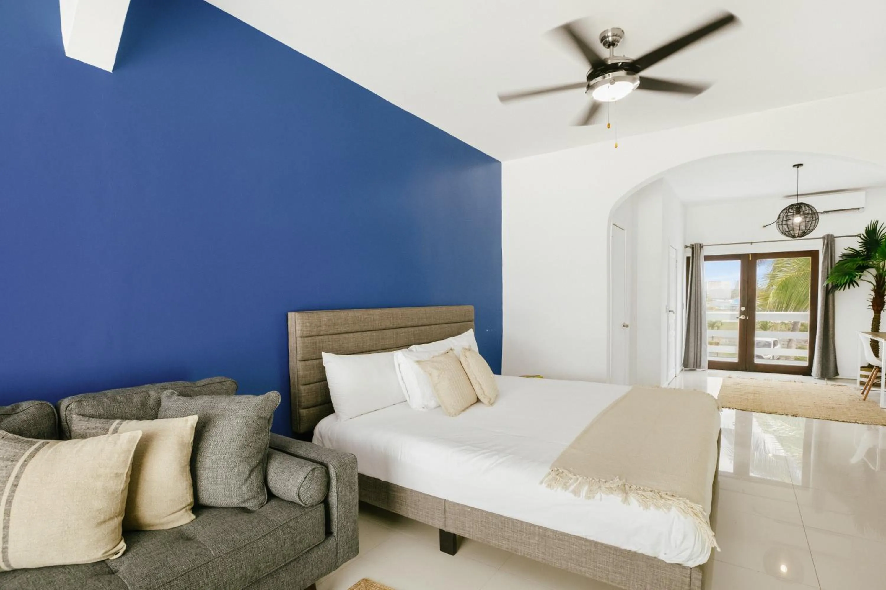 Bed in CocoVaa Beach Boutique Hotel