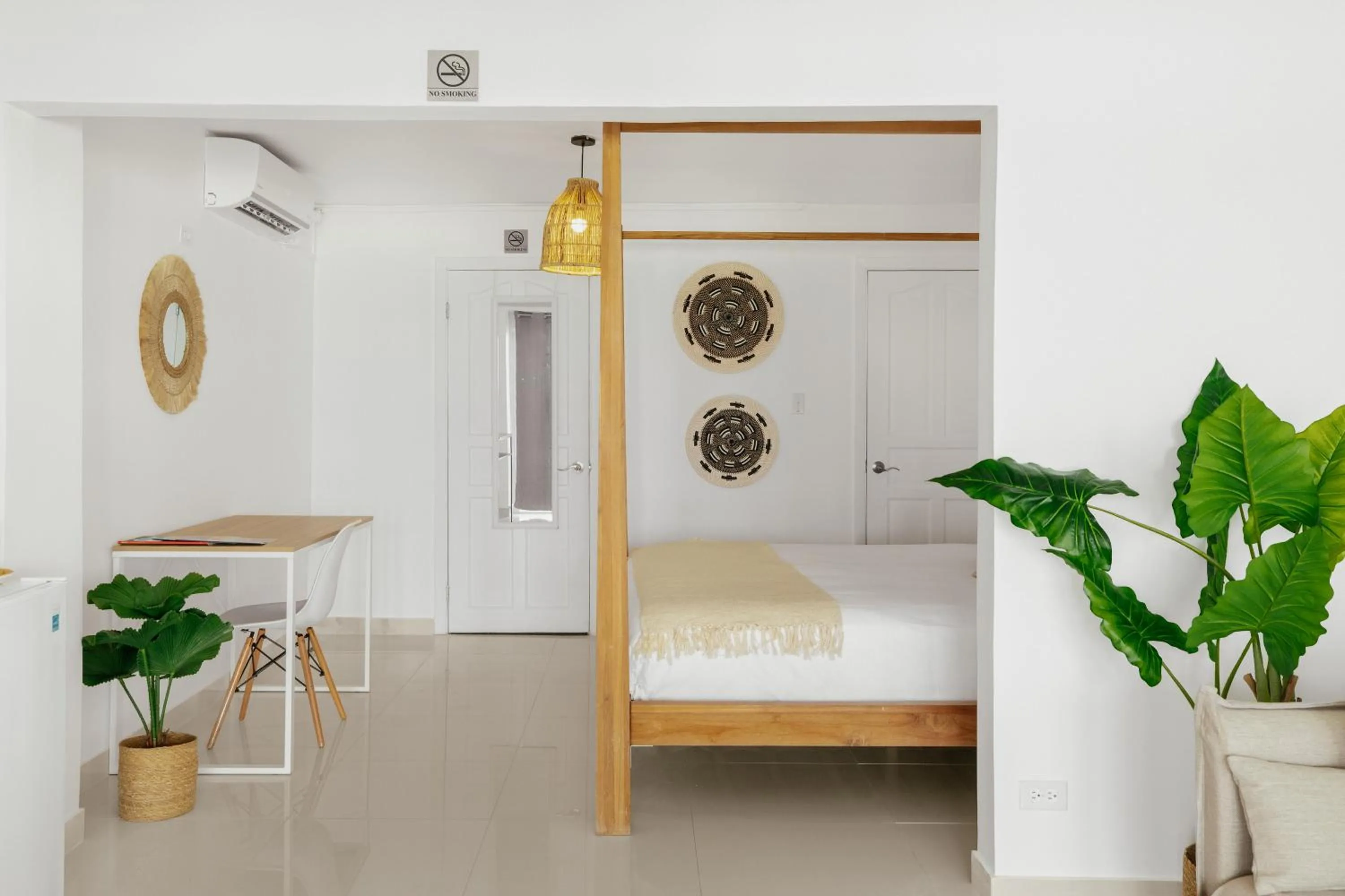 Bed in CocoVaa Beach Boutique Hotel