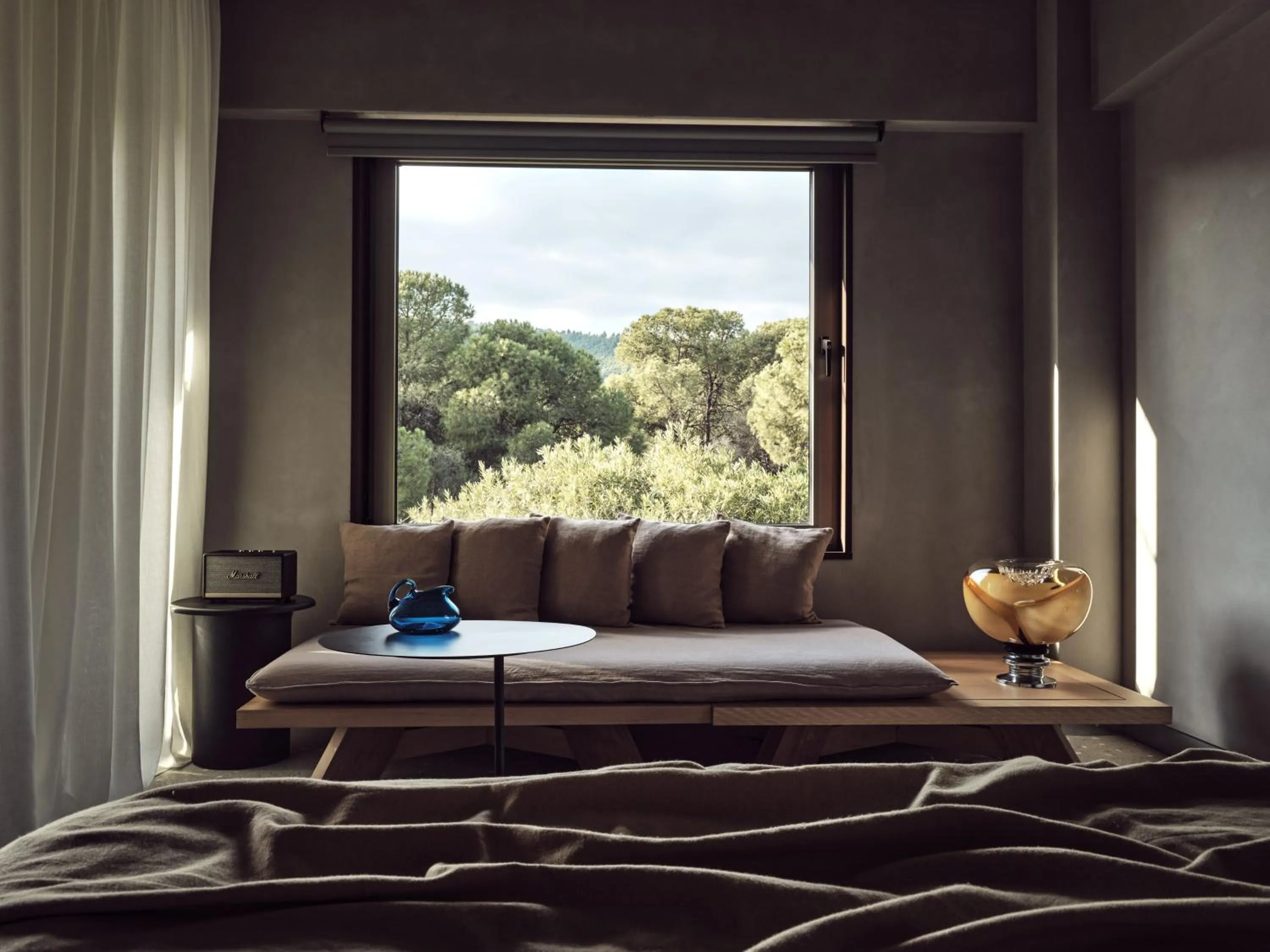 Living room, Bed in Ekies All Senses Resort, a Member of Design Hotels