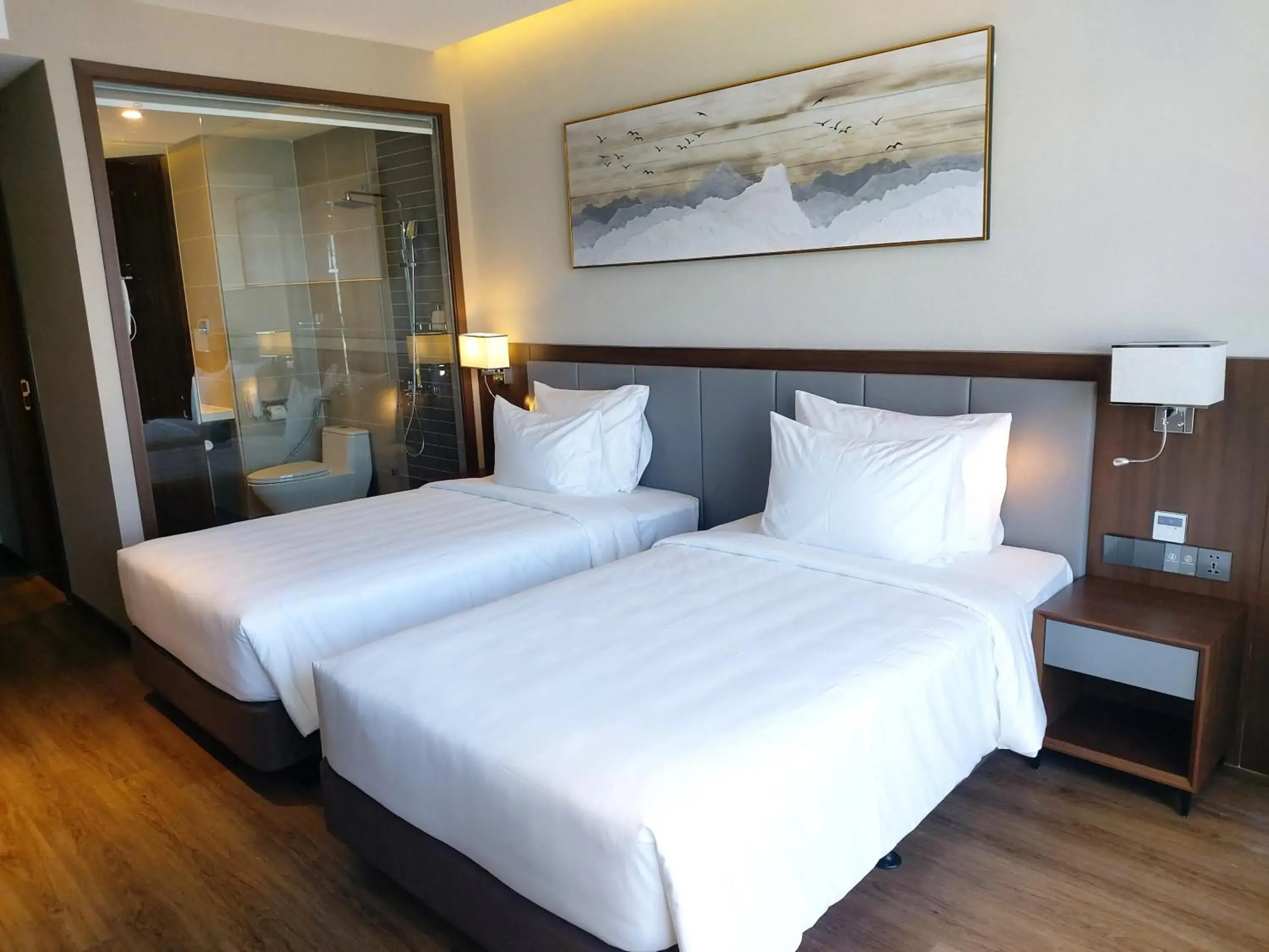Deluxe Double or Twin Room with Partial Sea View in Annova Nha Trang Hotel Deluxe Double or Twin Room with Partial Sea View in Annova Nha Trang Hotel