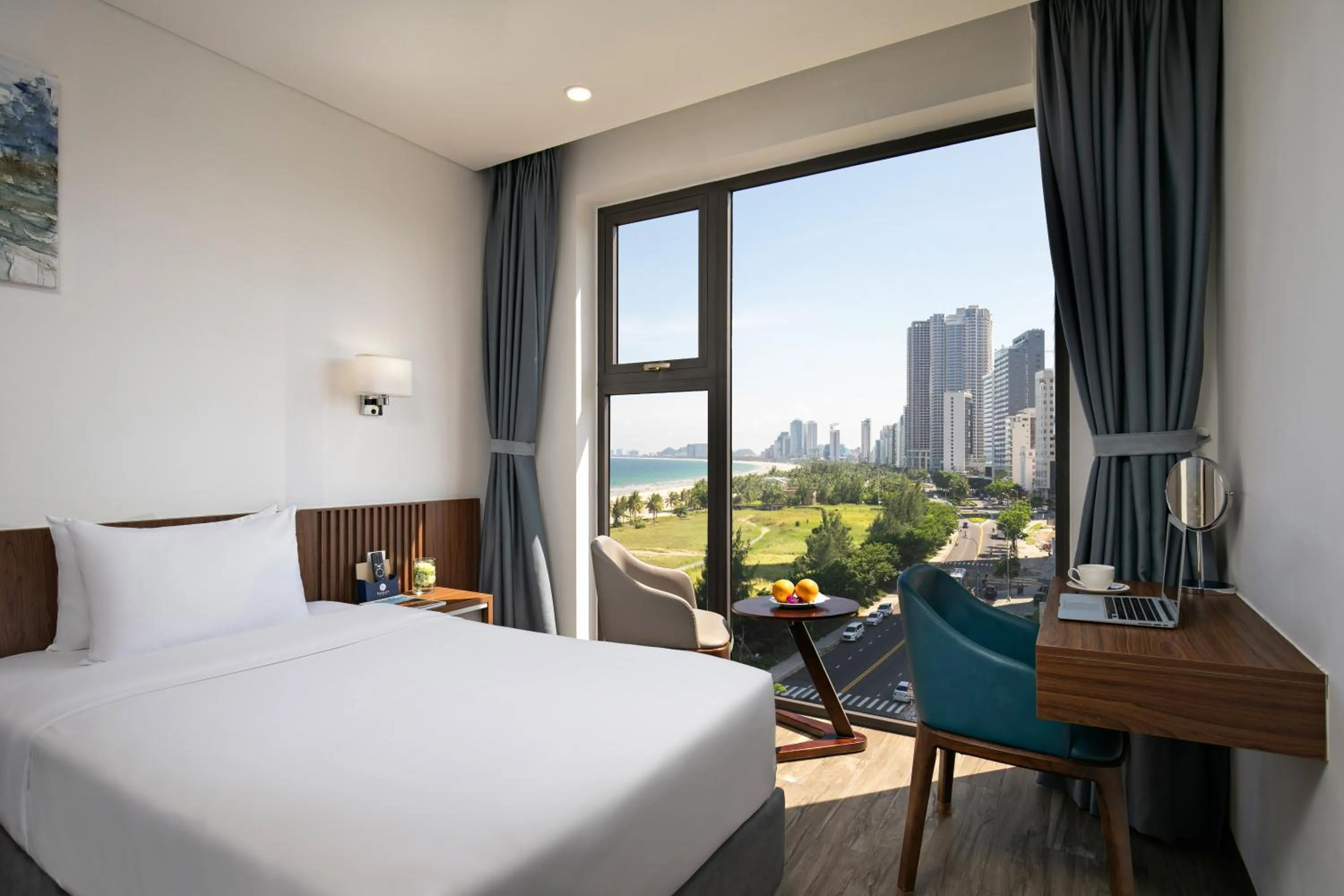 Bedroom, Bed in Mangata Beachfront Hotel - Rooftop Bar Sea View