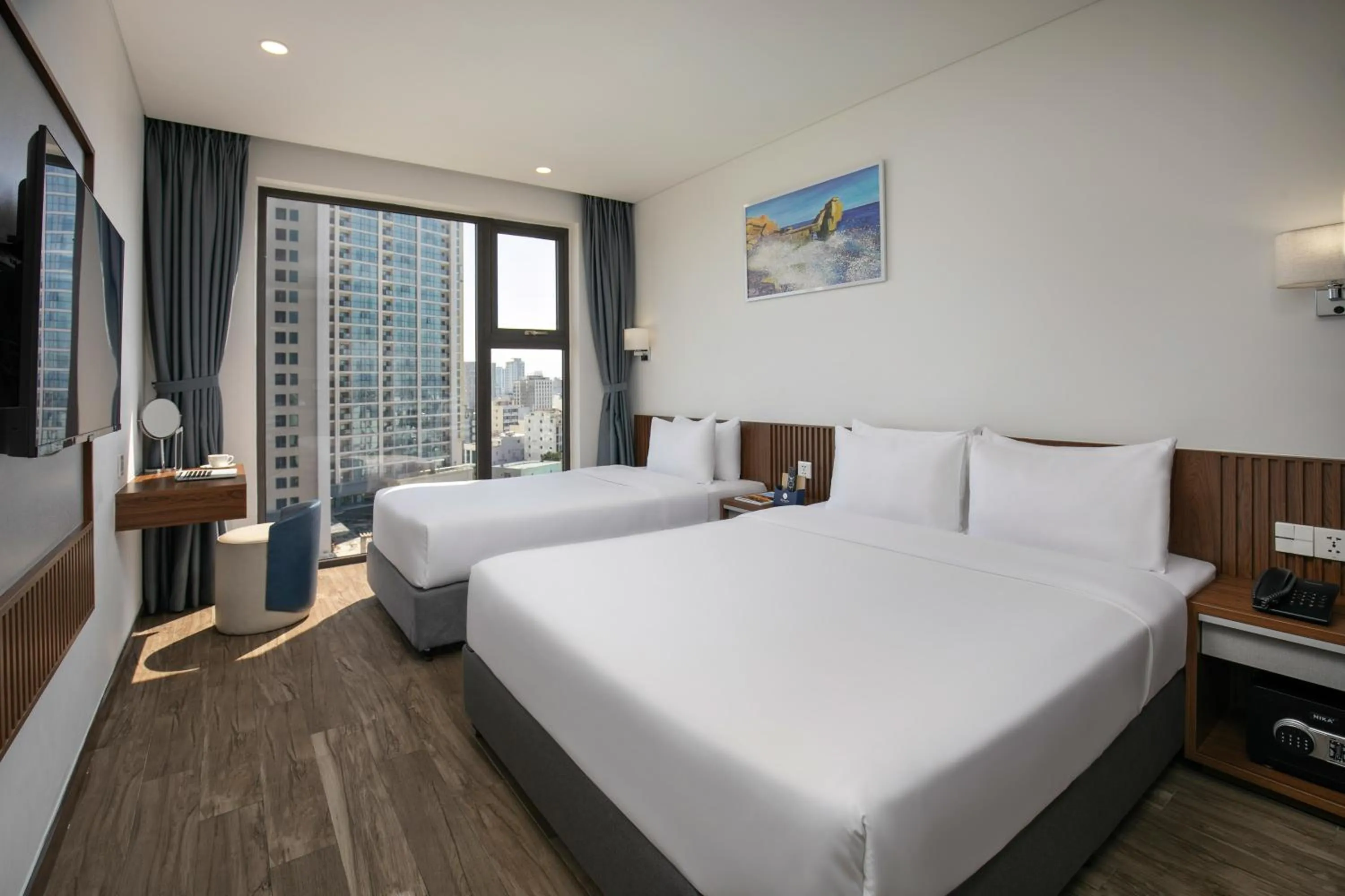 Bedroom, Bed in Mangata Beachfront Hotel - Rooftop Bar Sea View