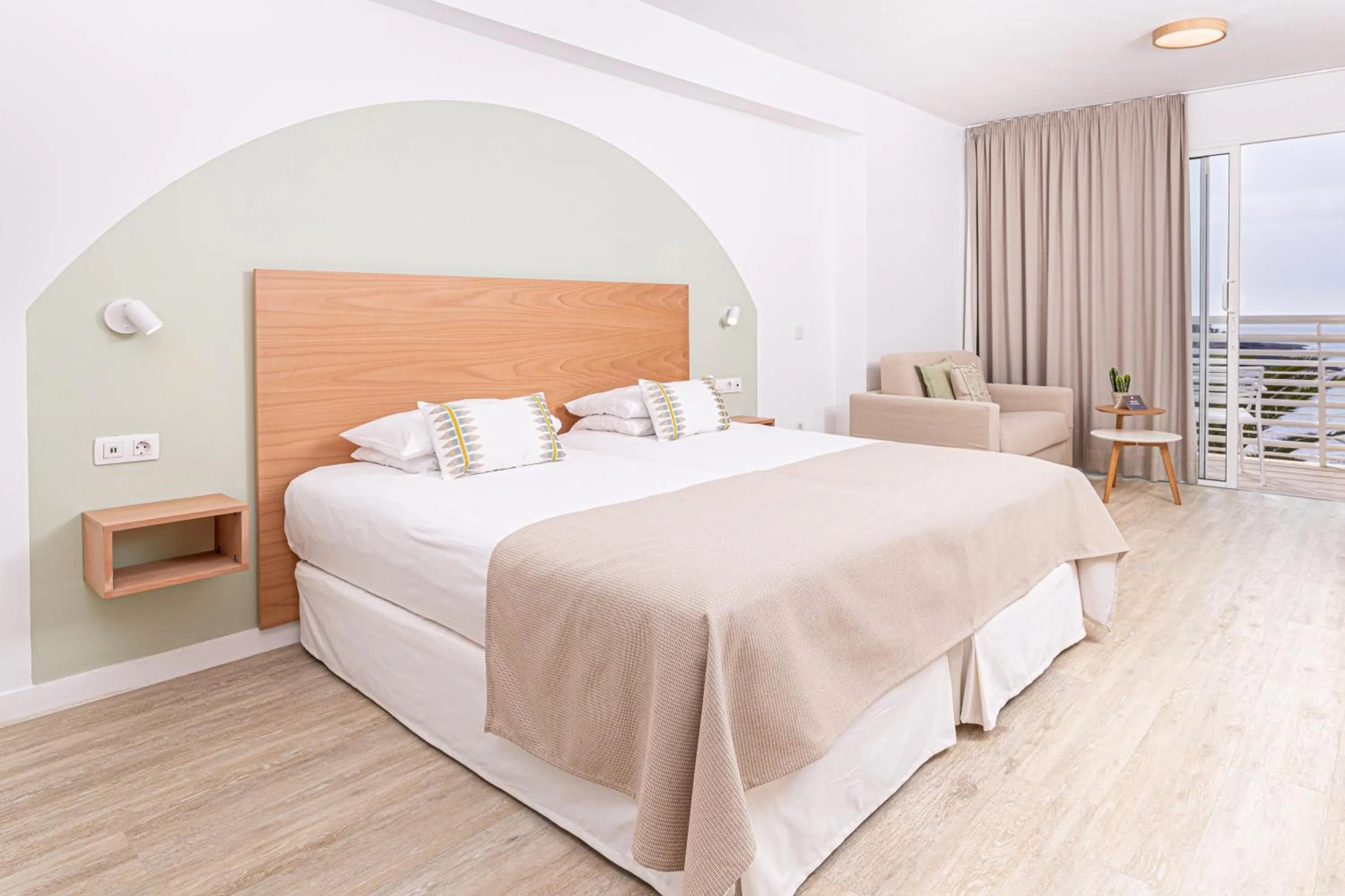 Bed in Atlantic Holiday Hotel