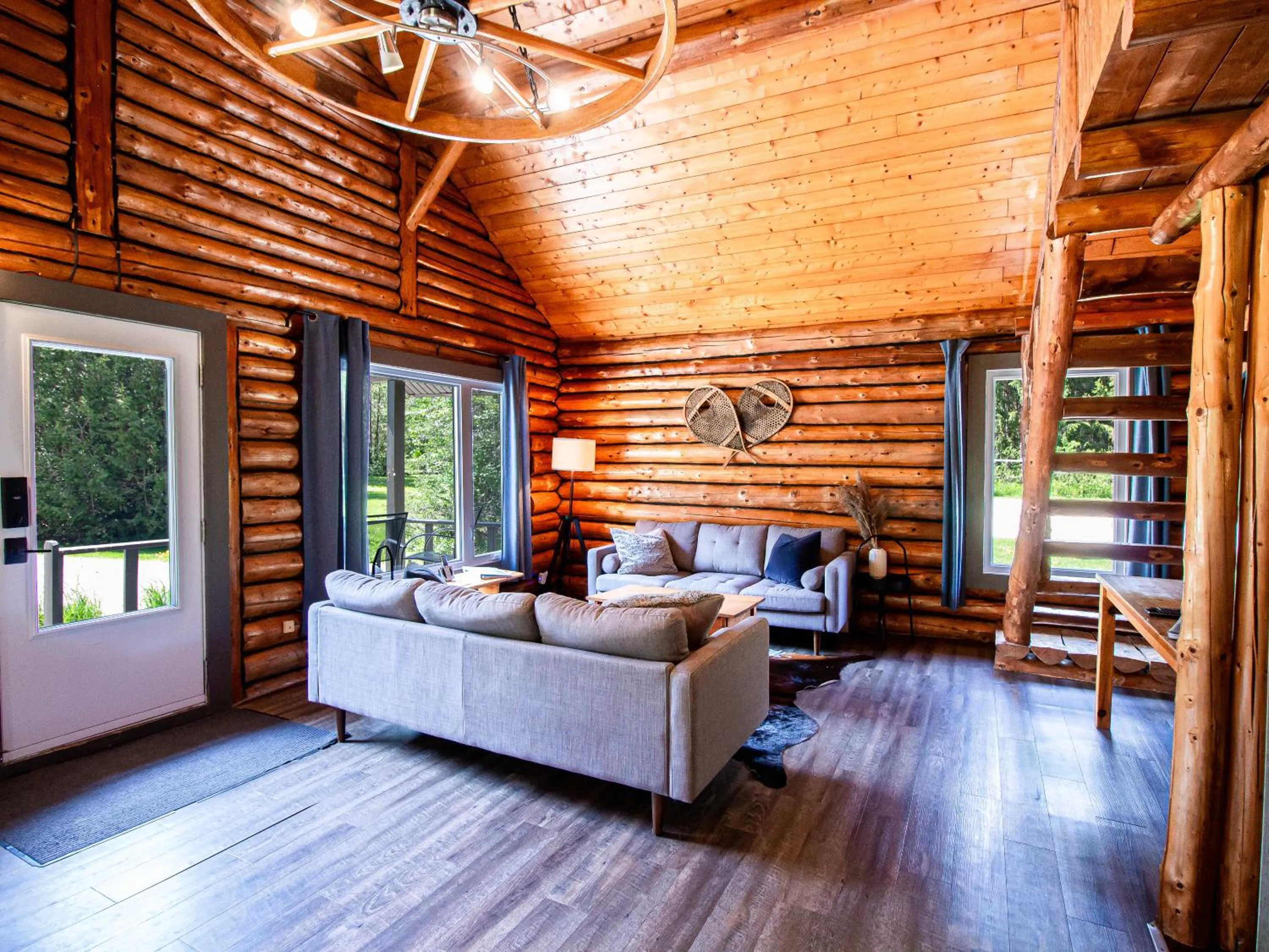 Living room in Les Chalets Tourisma - Chalet en bois rond avec spa - Chalet du 4e