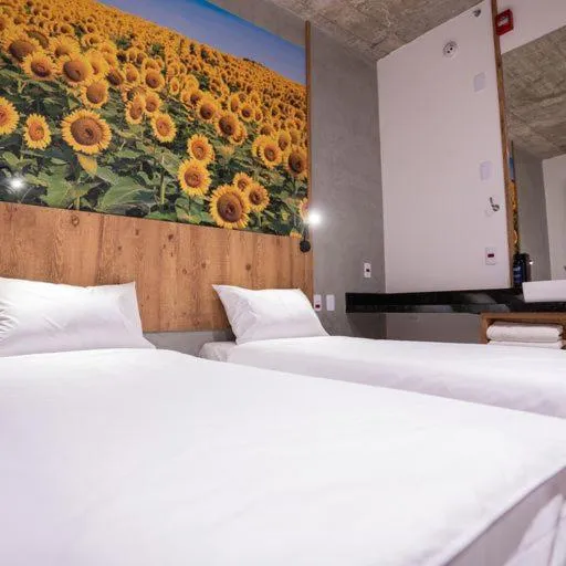 Photo of the whole room, Bed in CAMPOS DE HOLAMBRA INN