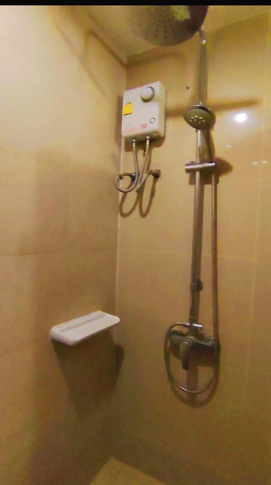 Bathroom in Deluxe Rooms by Suwan Style Agency