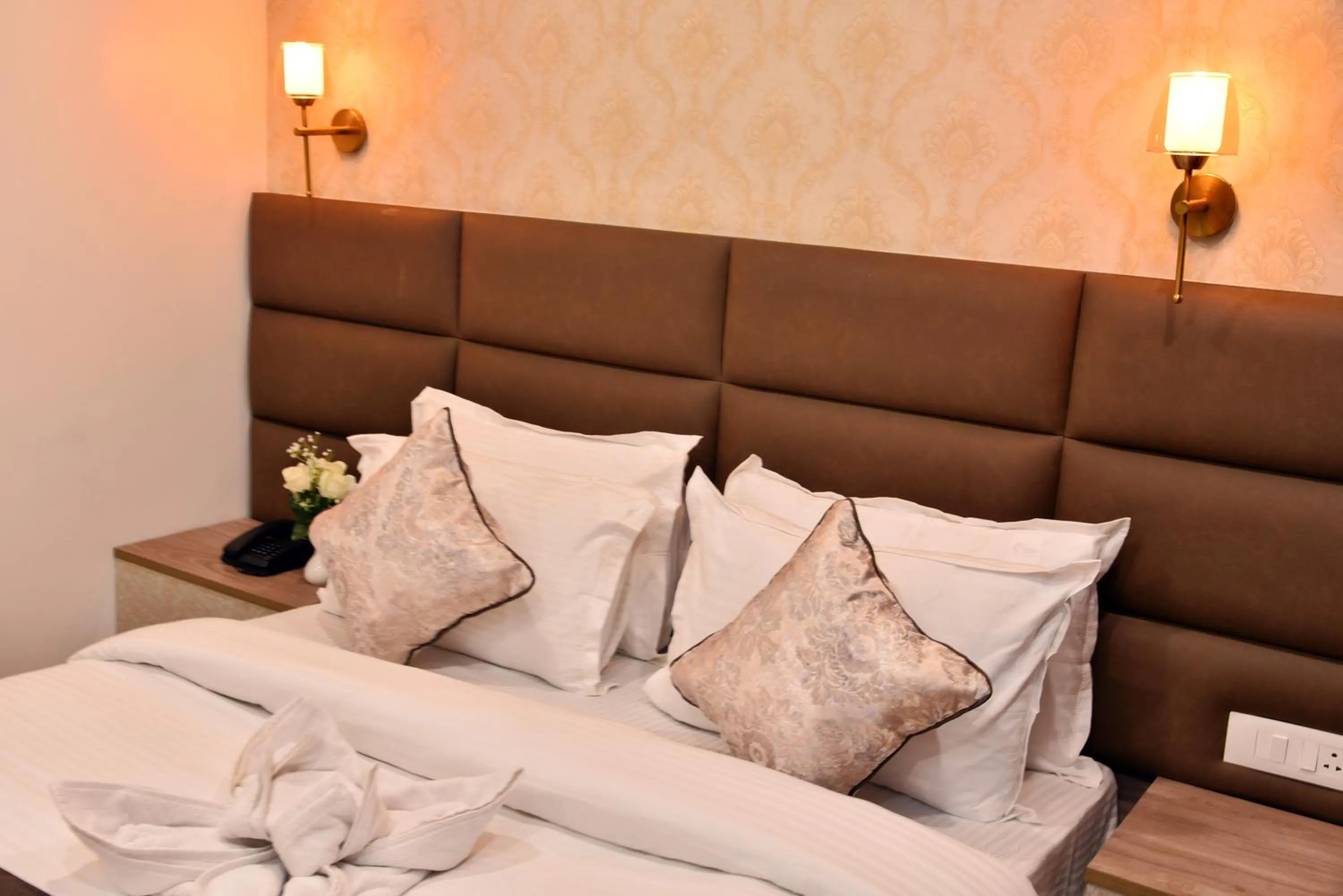 Bed in Rufina Pinasa Residency