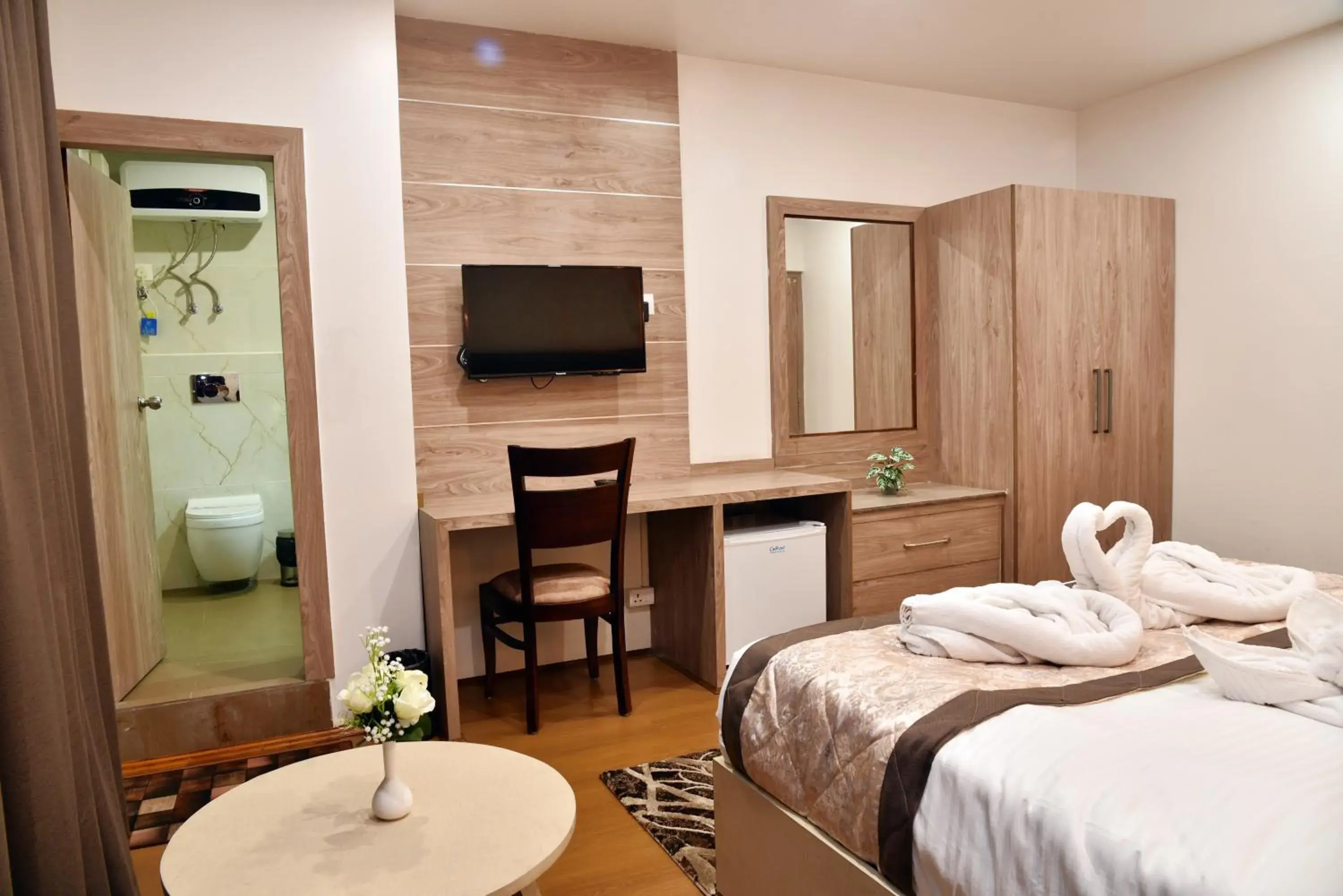 TV and multimedia, Bed in Rufina Pinasa Residency TV and multimedia, Bed in Rufina Pinasa Residency