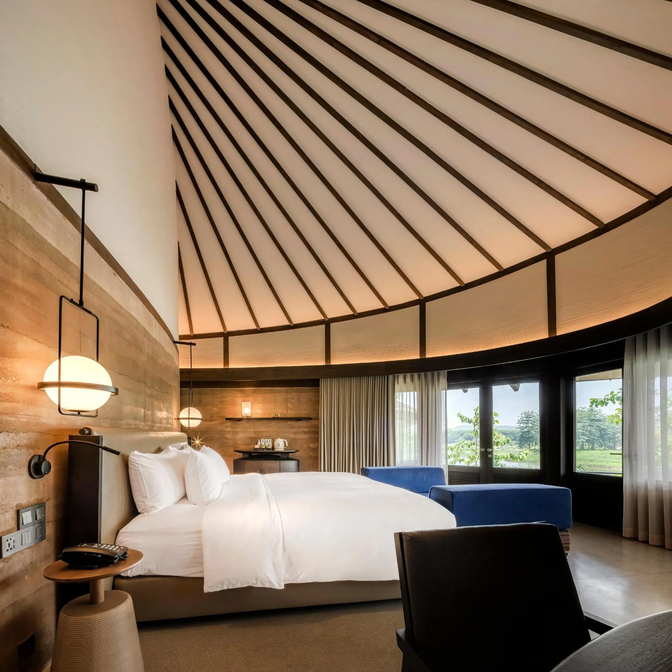 Bed in Patamma Hideaway Resort