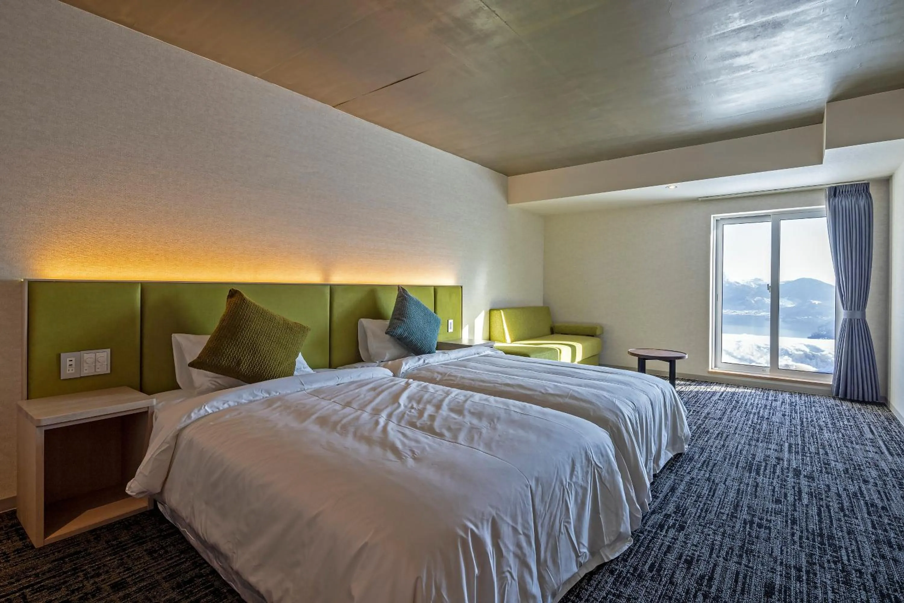 Bed in HOTEL COCOA RESORT