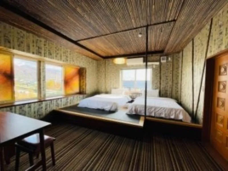 Bed in HOTEL COCOA RESORT