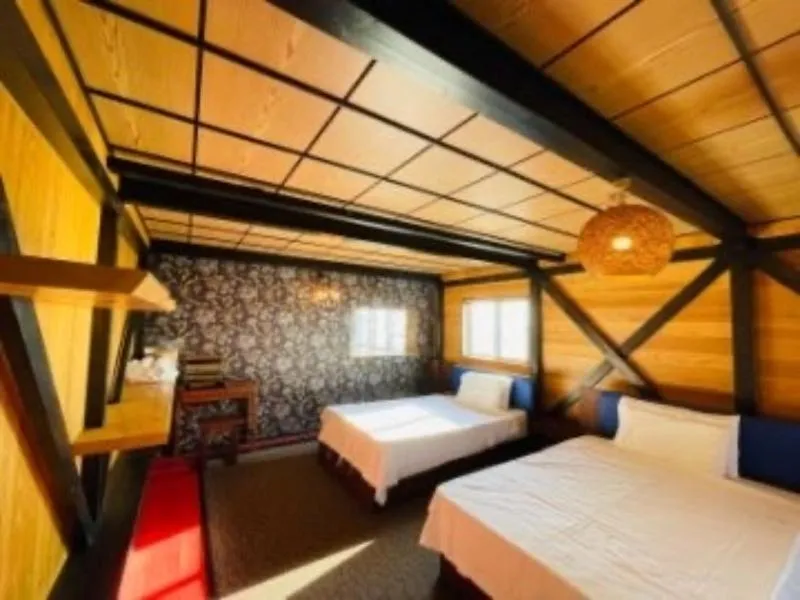 Bed in HOTEL COCOA RESORT