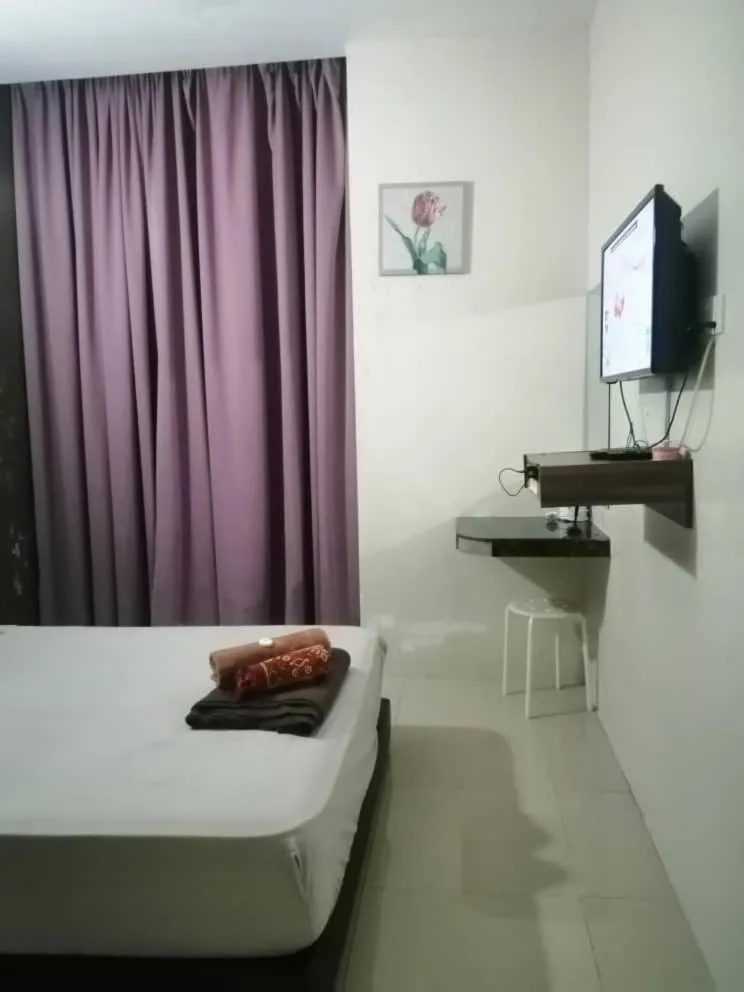 Bed in TGL Aparthotel Tanjung Lumpur